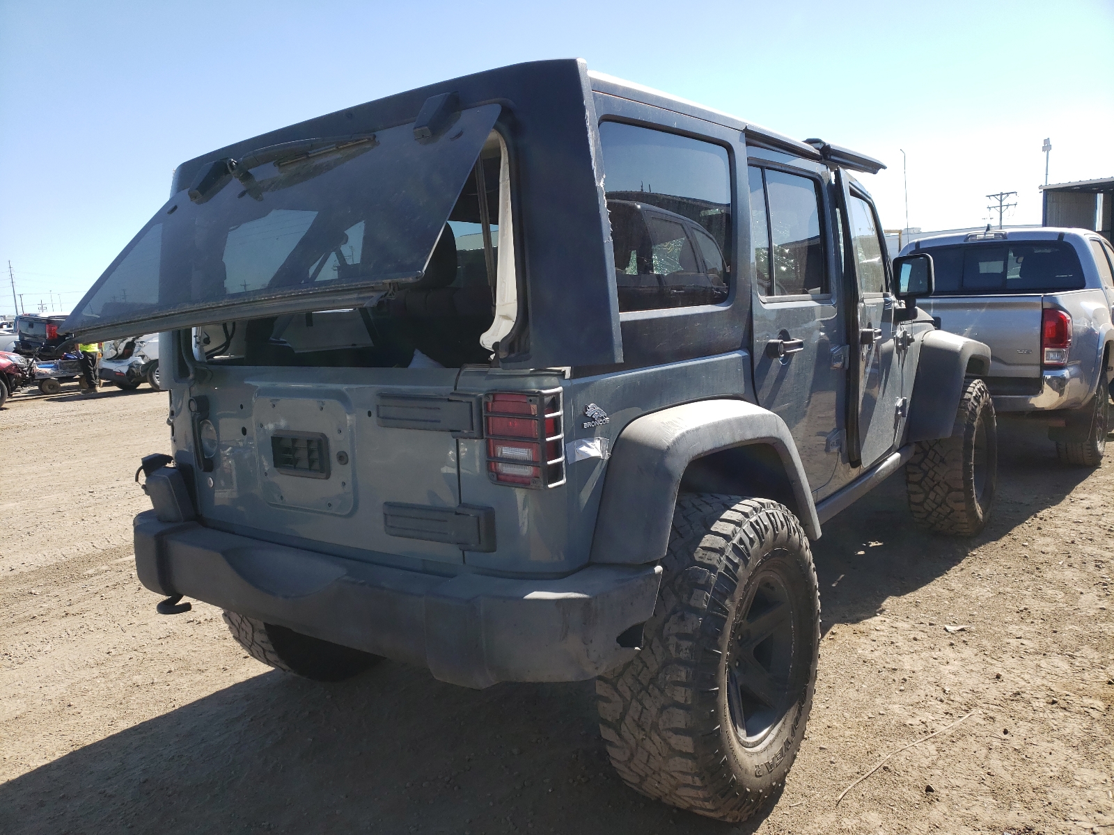 Photo 4 from auction – 2014 JEEP WRANGLER U with VIN 1C4HJWFG1EL108429