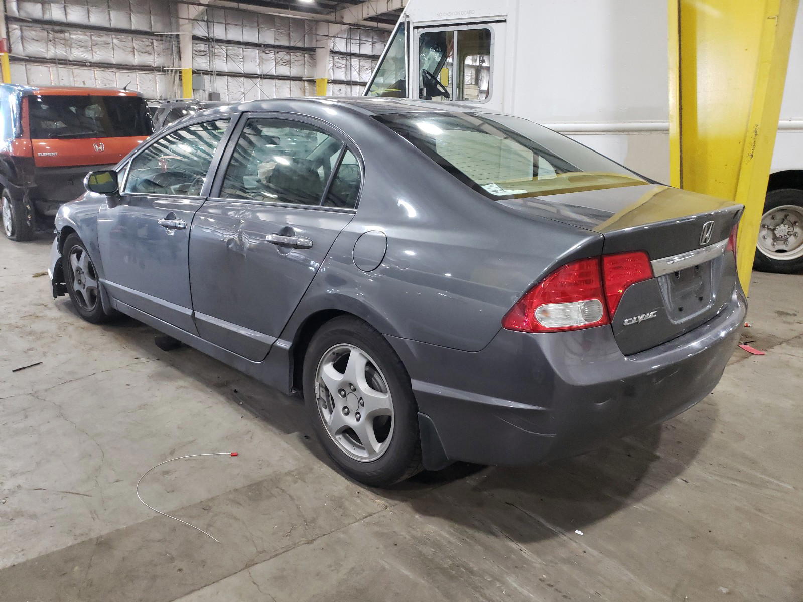 Photo 3 from auction – 2010 HONDA CIVIC LX with VIN 19XFA1F58AE024586