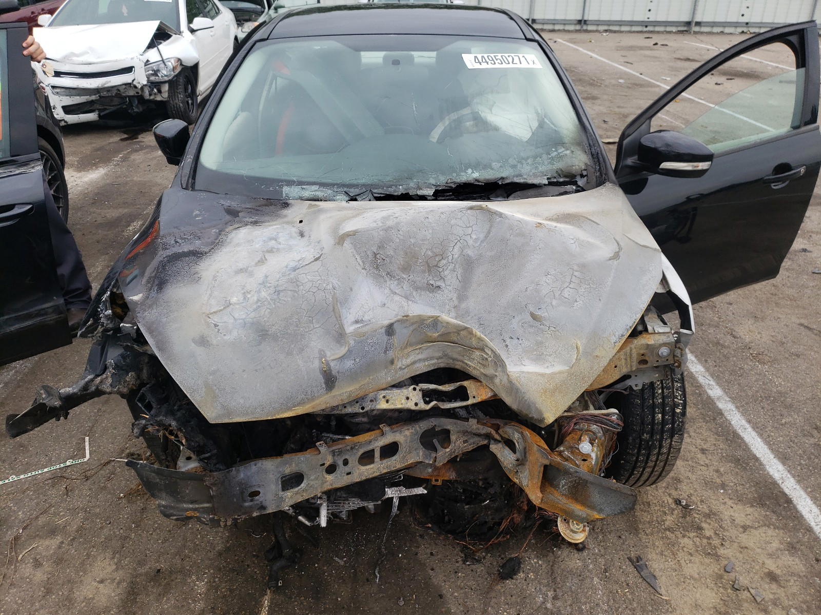 Photo 7 from auction – 2017 FORD FOCUS SE with VIN 1FADP3FE6HL292545