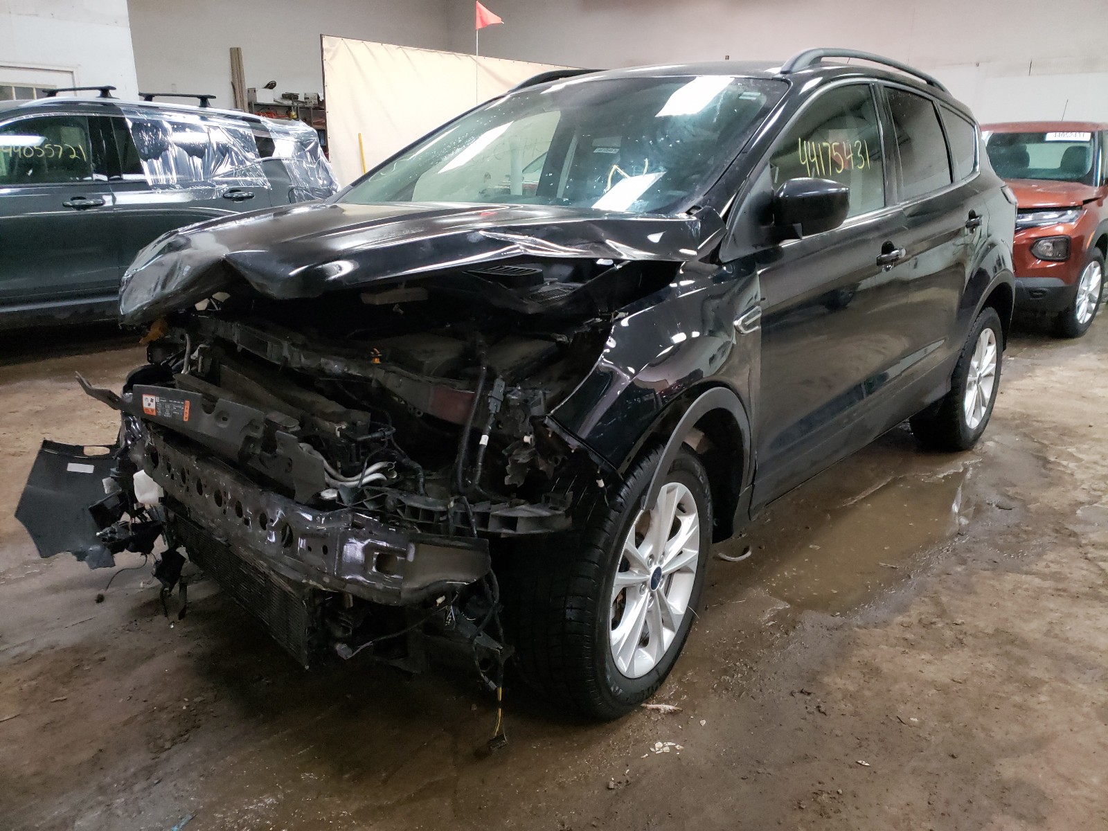 Photo 2 from auction – 2017 FORD ESCAPE SE with VIN 1FMCU9GD6HUD22060