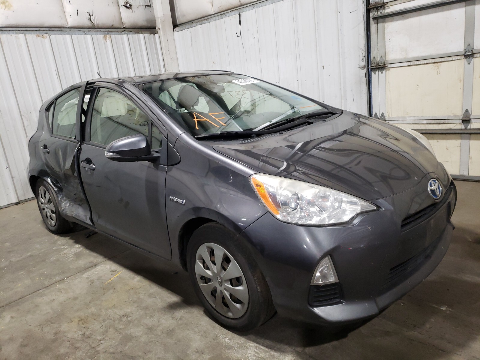TOYOTA PRIUS C 2013 with VIN JTDKDTB38D1056791 - Photo from auction
