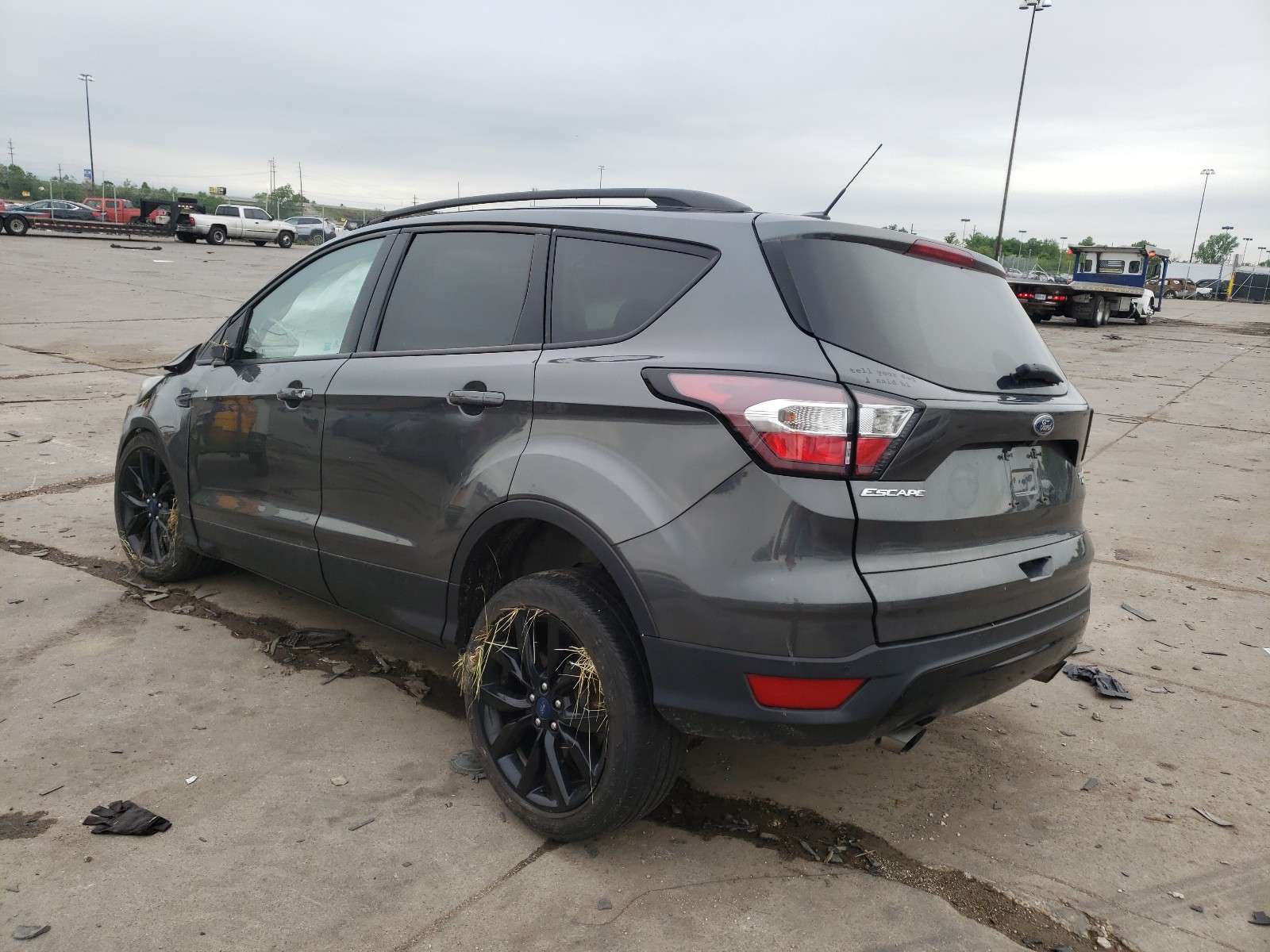 Photo 3 from auction – 2017 FORD ESCAPE TIT with VIN 1FMCU9J91HUC17107