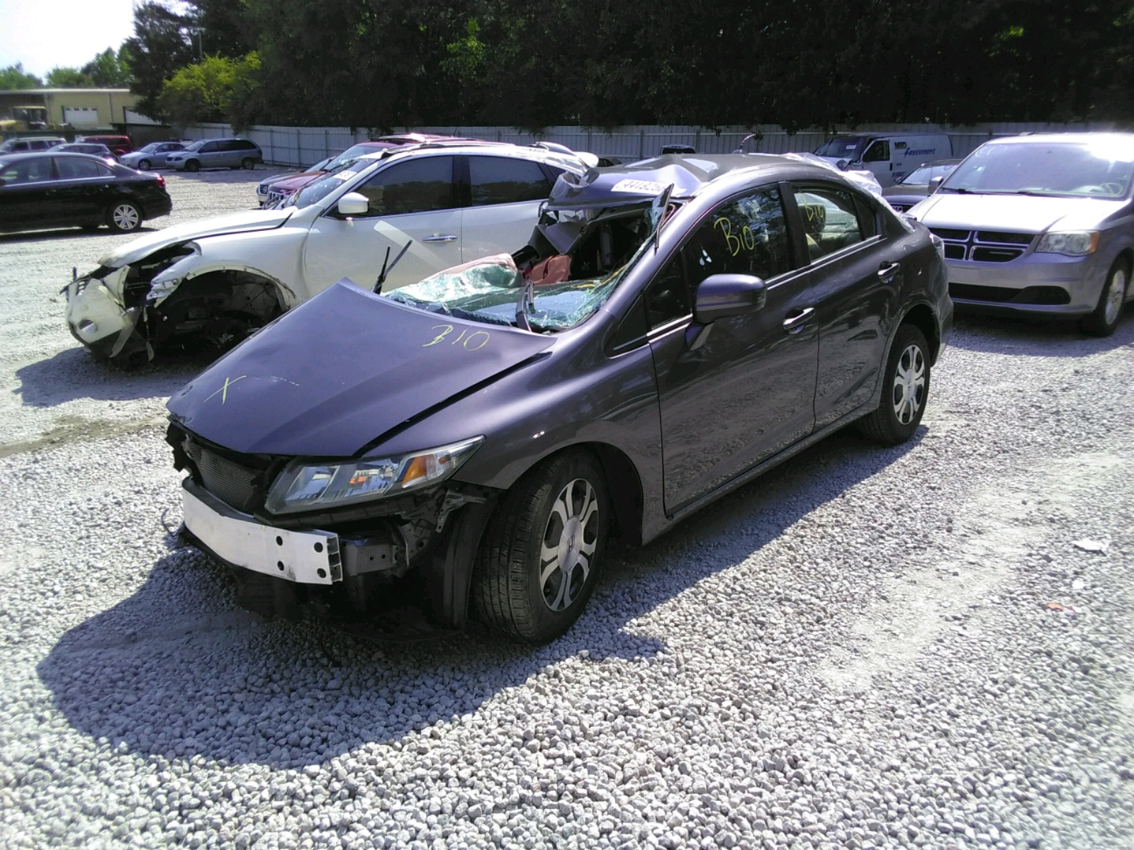 Photo 2 from auction – 2014 HONDA CIVIC HYBR with VIN 19XFB4F29EE200913