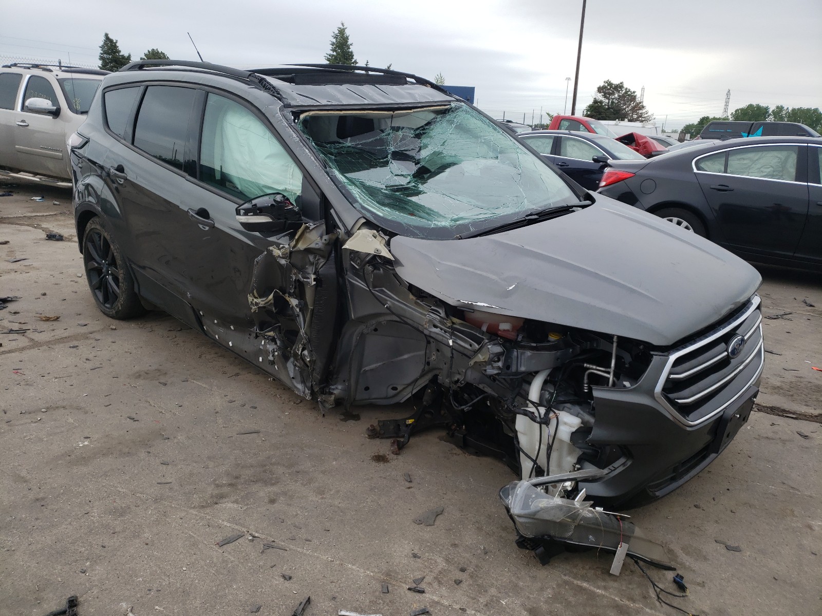 FORD ESCAPE TIT 2017 with VIN 1FMCU9J91HUC17107 - Photo from auction