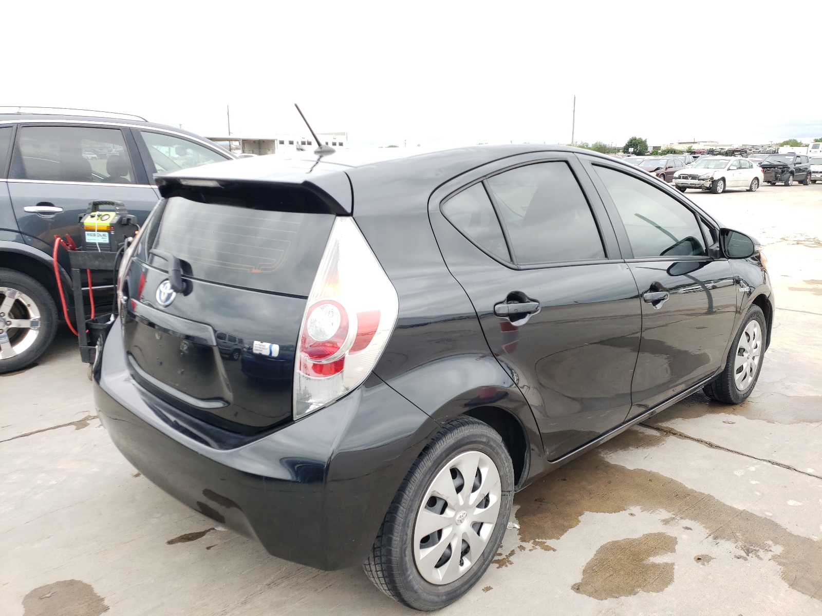 Photo 4 from auction – 2014 TOYOTA PRIUS C with VIN JTDKDTB35E1575217