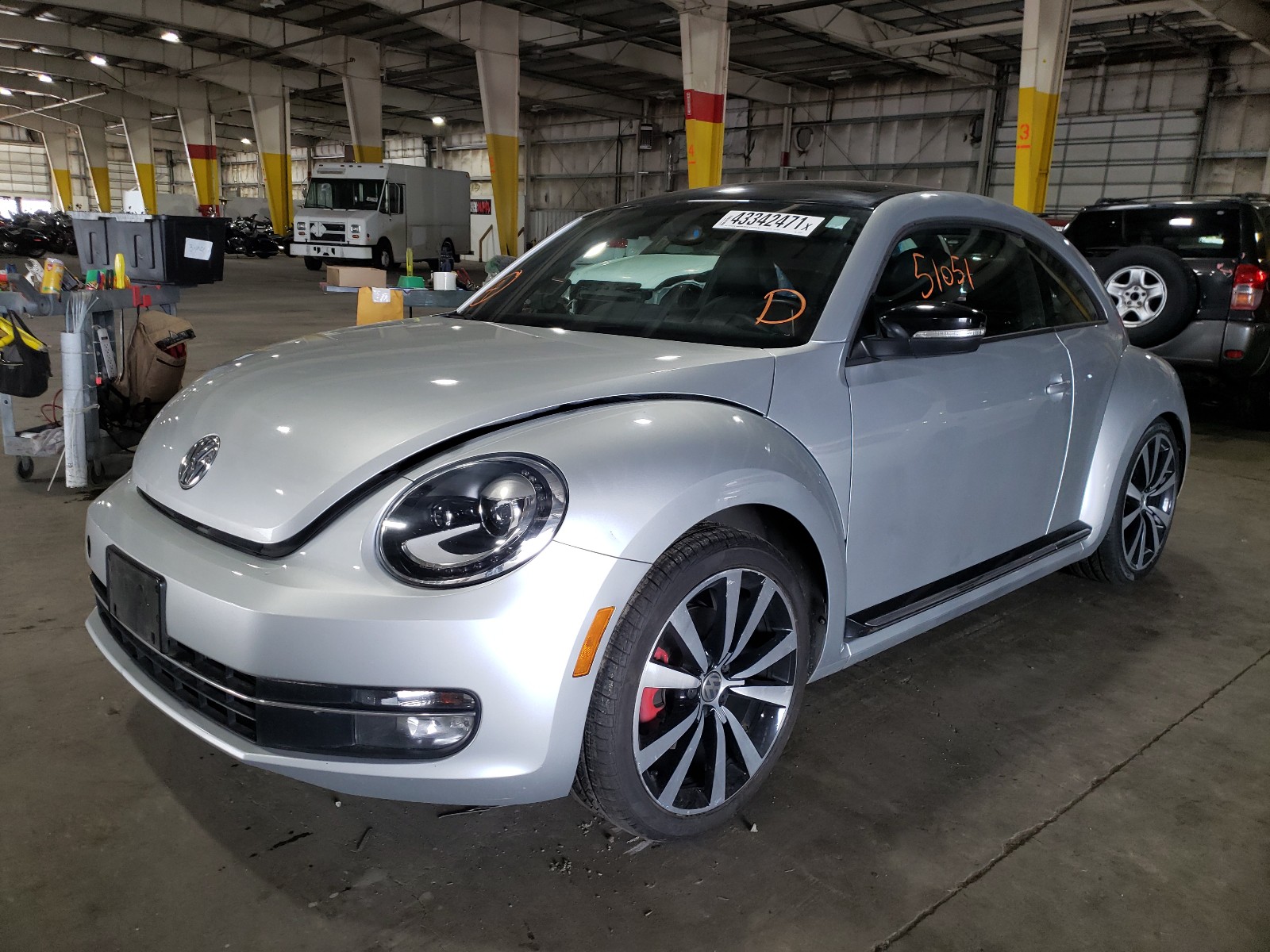 Photo 2 from auction – 2013 VOLKSWAGEN BEETLE TUR with VIN 3VWVA7AT1DM629626
