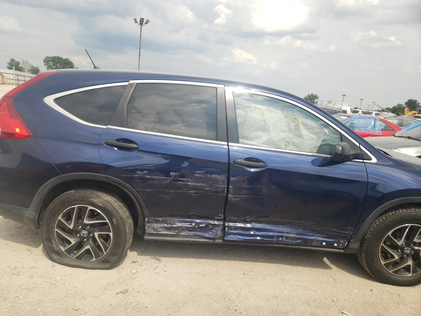 Photo 9 from auction – 2016 HONDA CR-V SE with VIN 5J6RM4H48GL126703