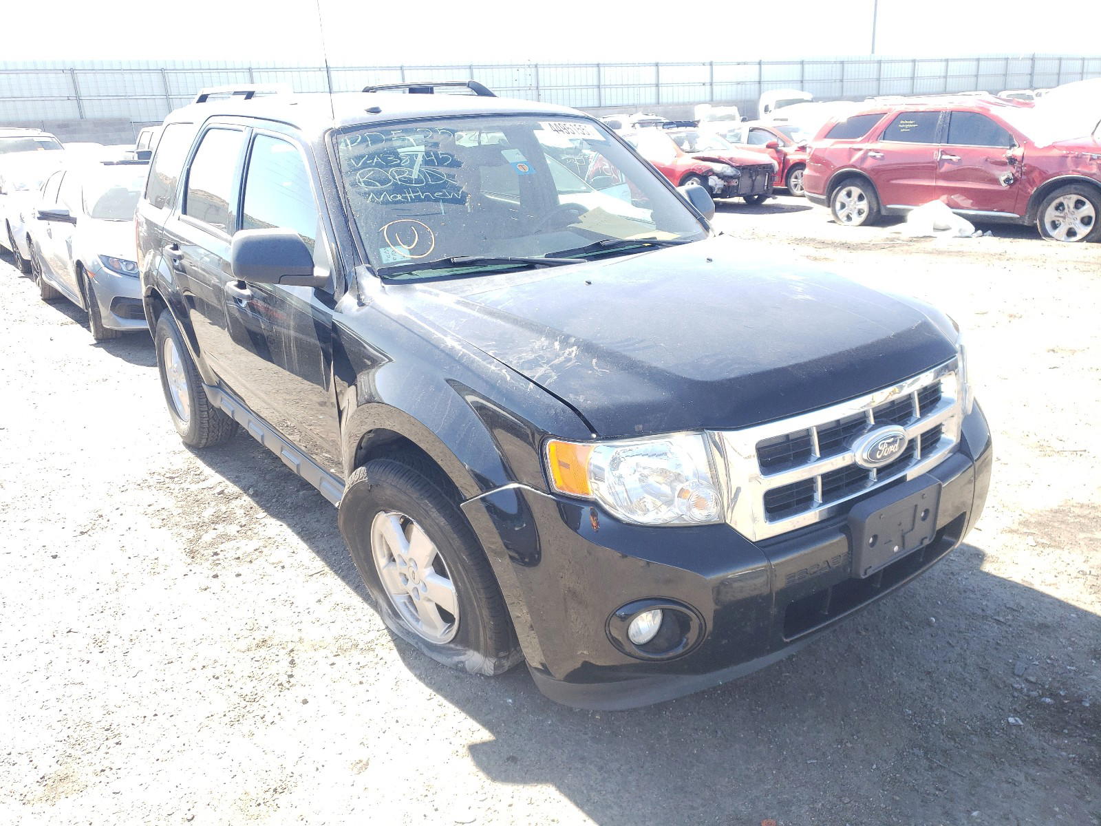 FORD ESCAPE XLT 2012 with VIN 1FMCU0D7XCKA38445 - Photo from auction