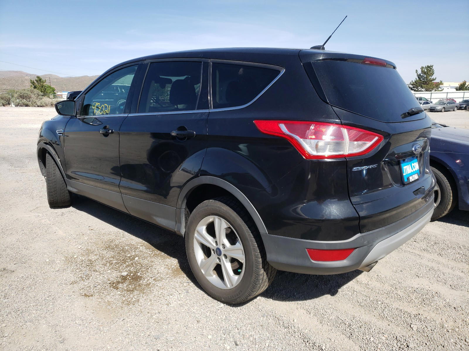 Photo 3 from auction – 2014 FORD ESCAPE SE with VIN 1FMCU9GX7EUC00295