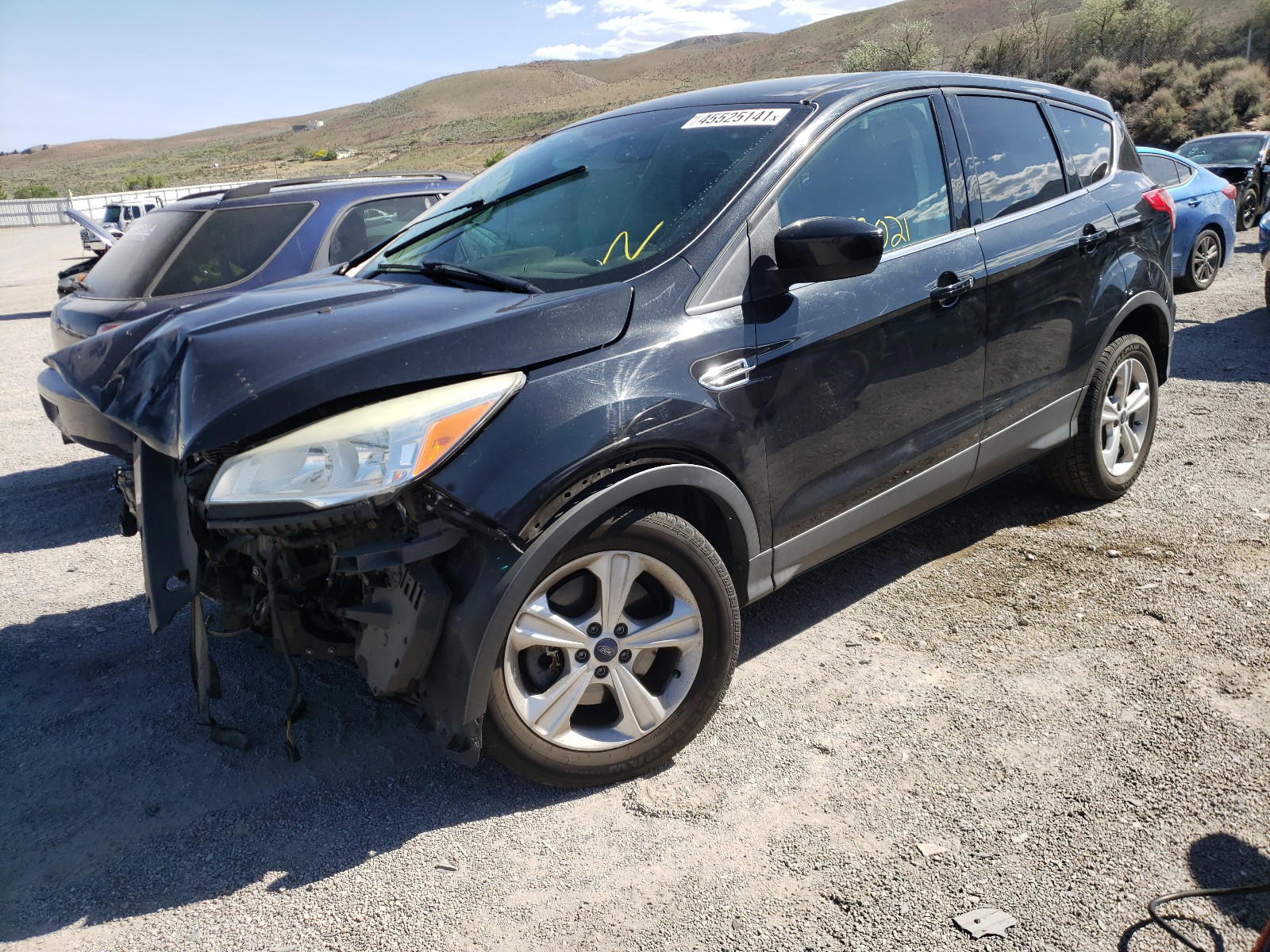 Photo 2 from auction – 2014 FORD ESCAPE SE with VIN 1FMCU9GX7EUC00295