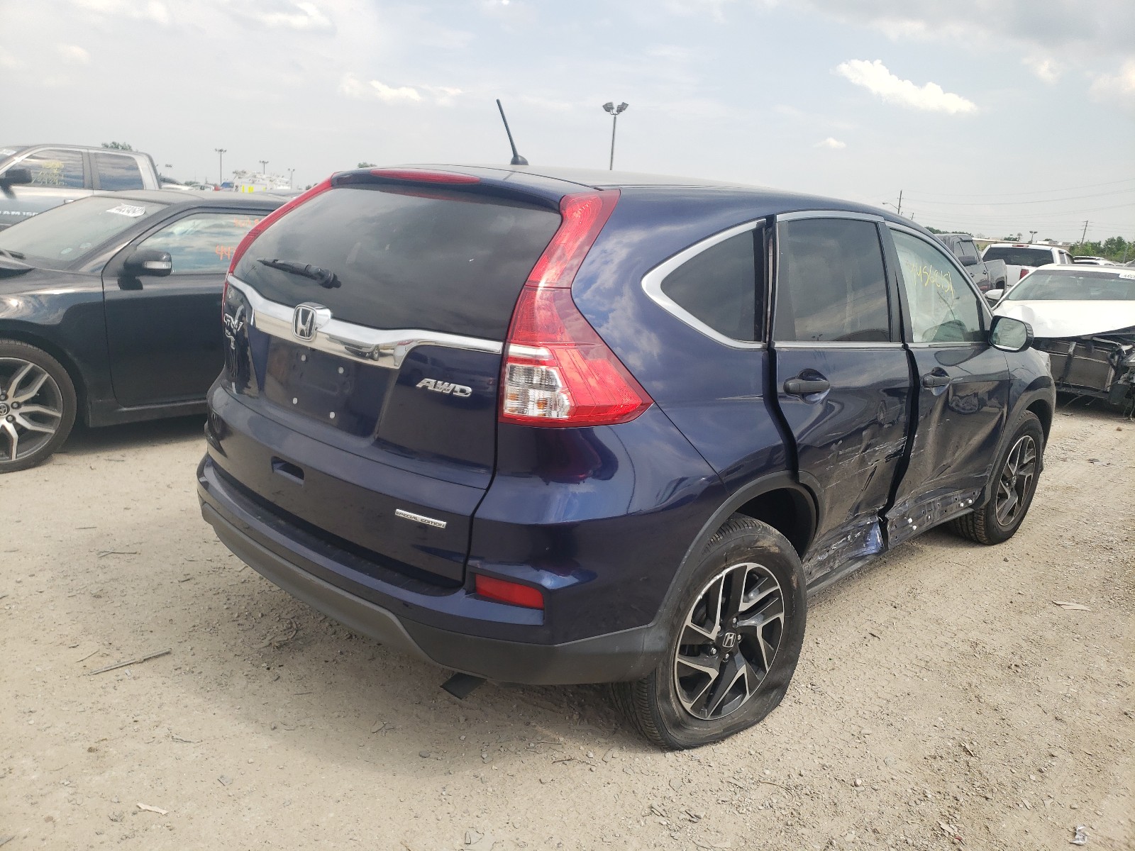 Photo 4 from auction – 2016 HONDA CR-V SE with VIN 5J6RM4H48GL126703