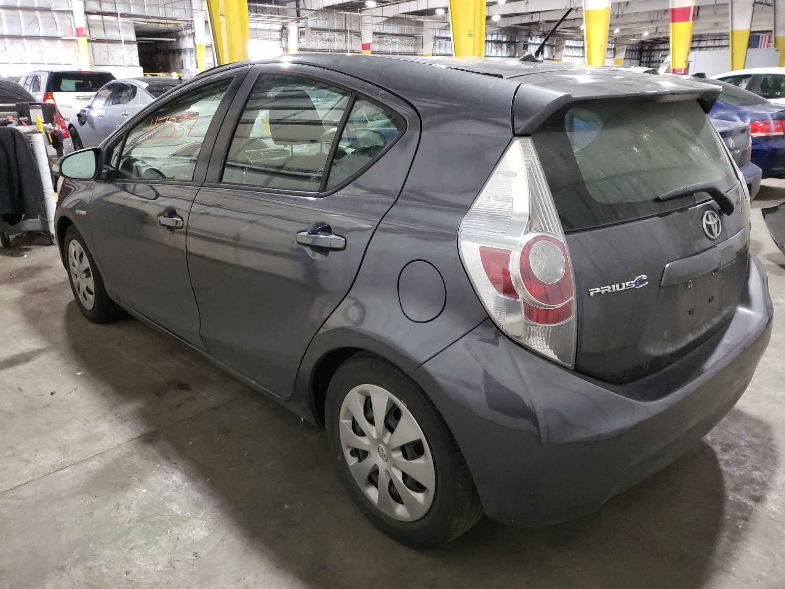 Photo 3 from auction – 2013 TOYOTA PRIUS C with VIN JTDKDTB38D1056791