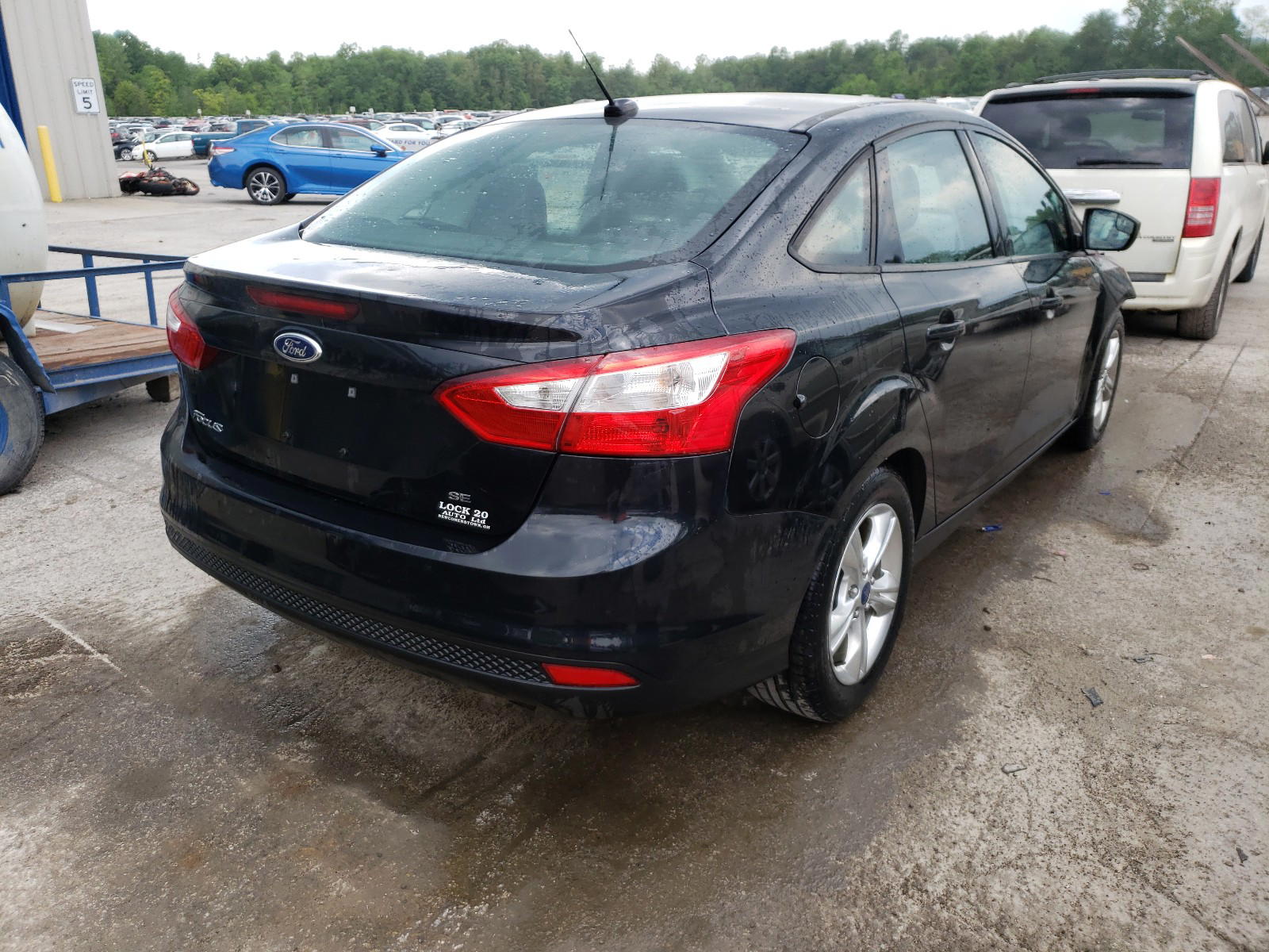 Photo 4 from auction – 2014 FORD FOCUS SE with VIN 1FADP3F21EL245103