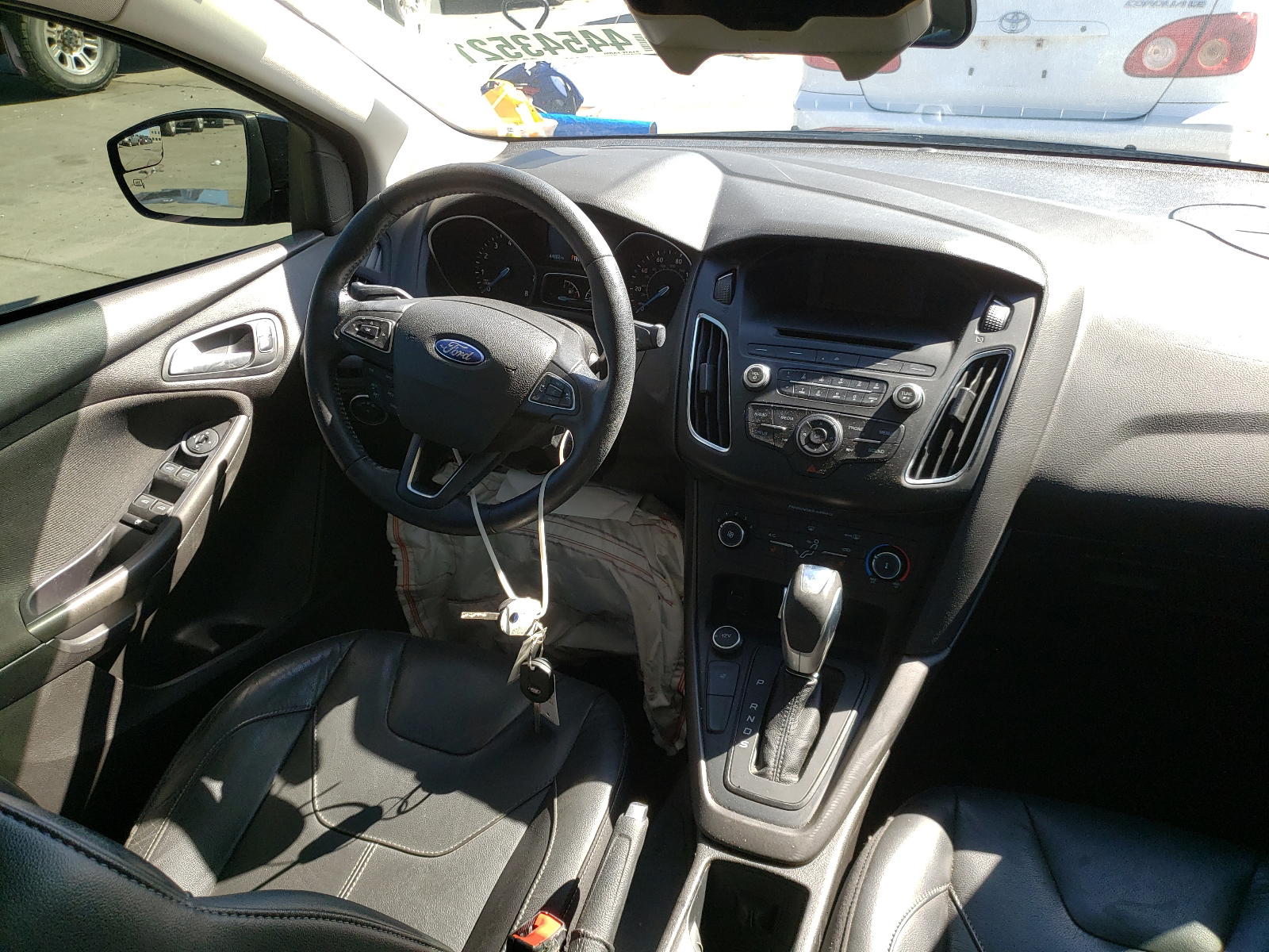 Photo 9 from auction – 2016 FORD FOCUS SE with VIN 1FADP3F26GL354806