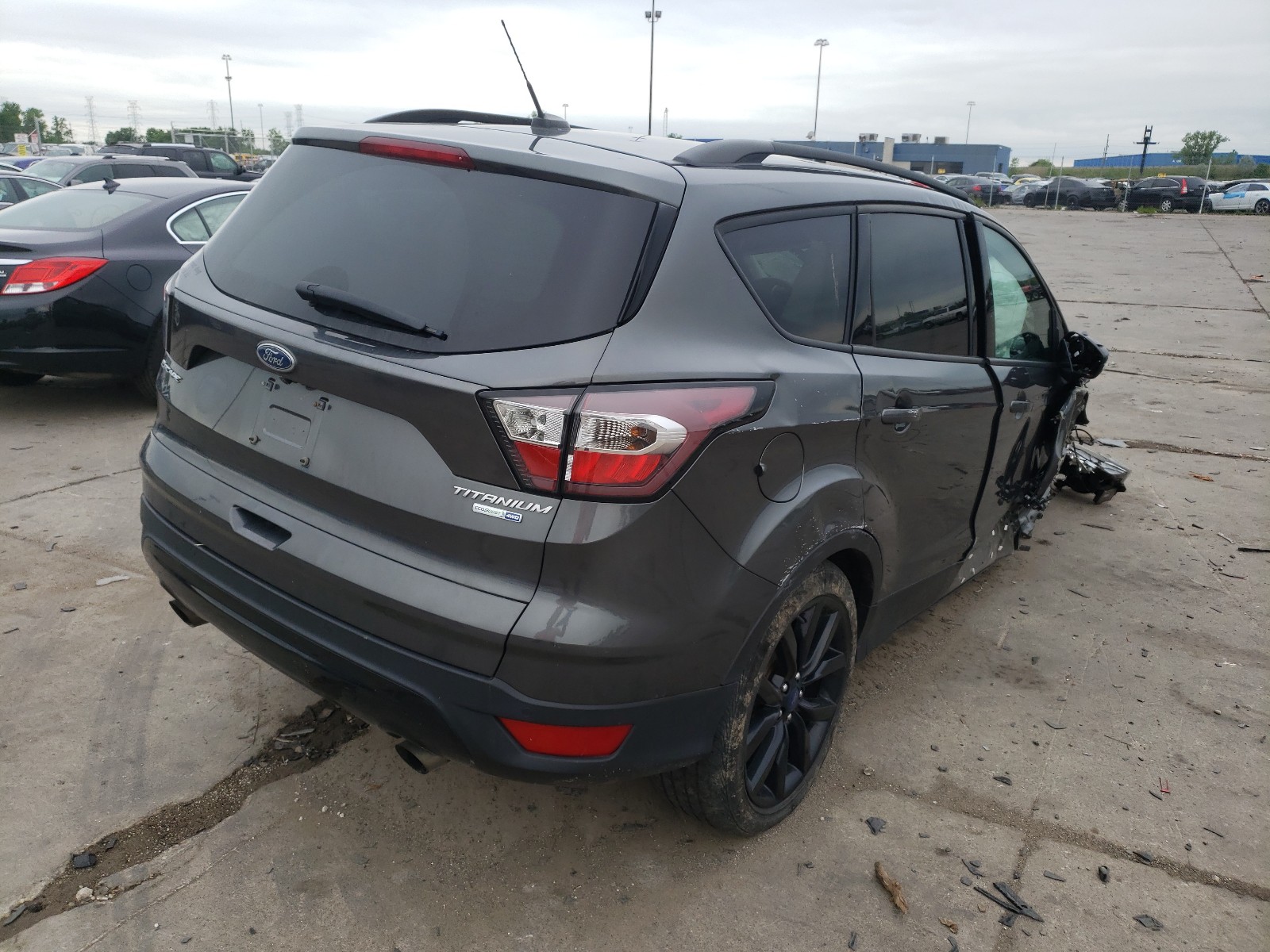 Photo 4 from auction – 2017 FORD ESCAPE TIT with VIN 1FMCU9J91HUC17107