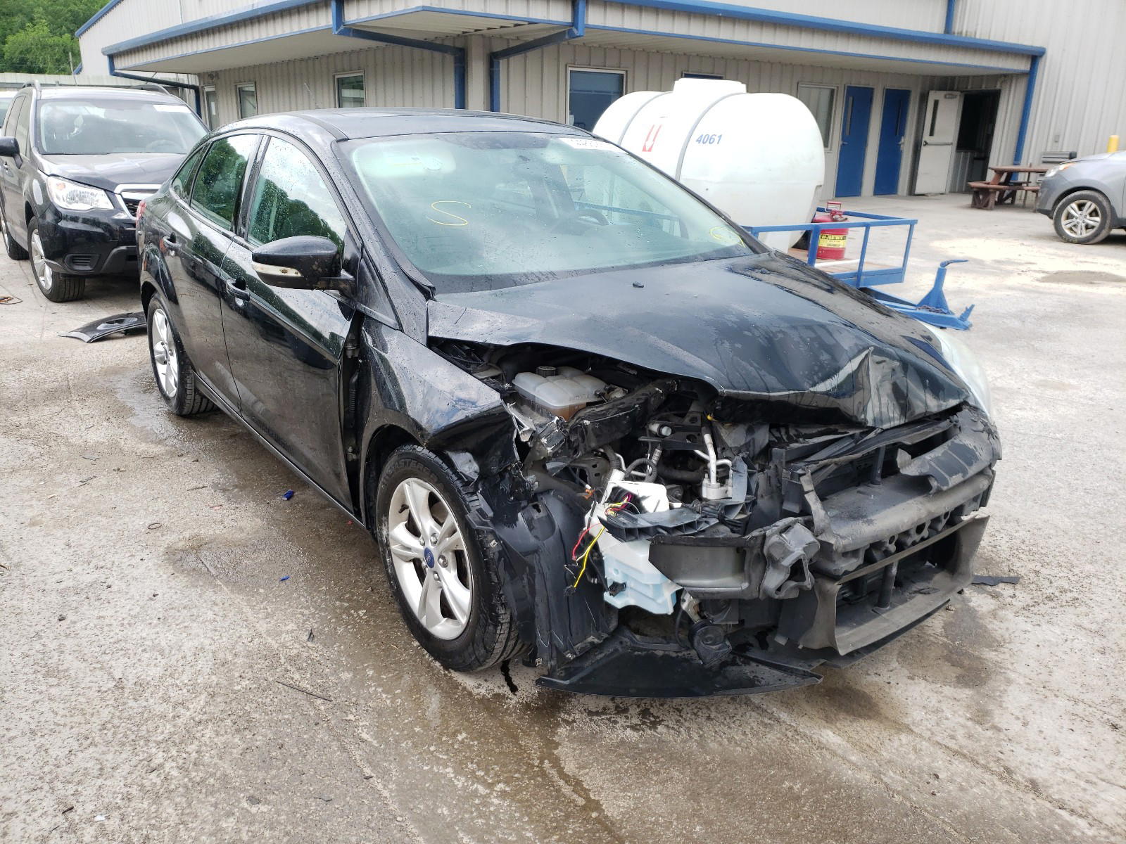 FORD FOCUS SE 2014 with VIN 1FADP3F21EL245103 - Photo from auction