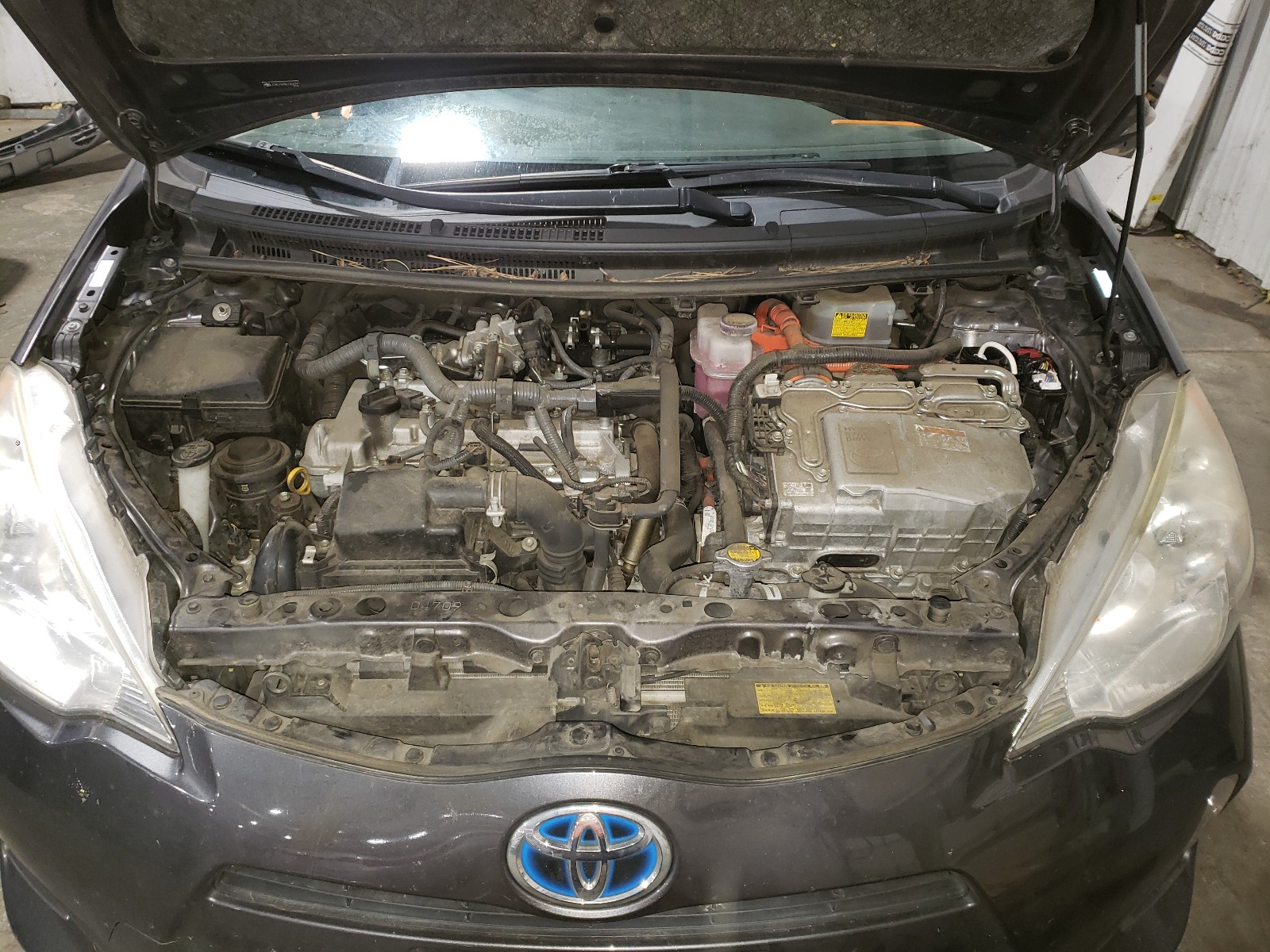 Photo 7 from auction – 2013 TOYOTA PRIUS C with VIN JTDKDTB38D1056791