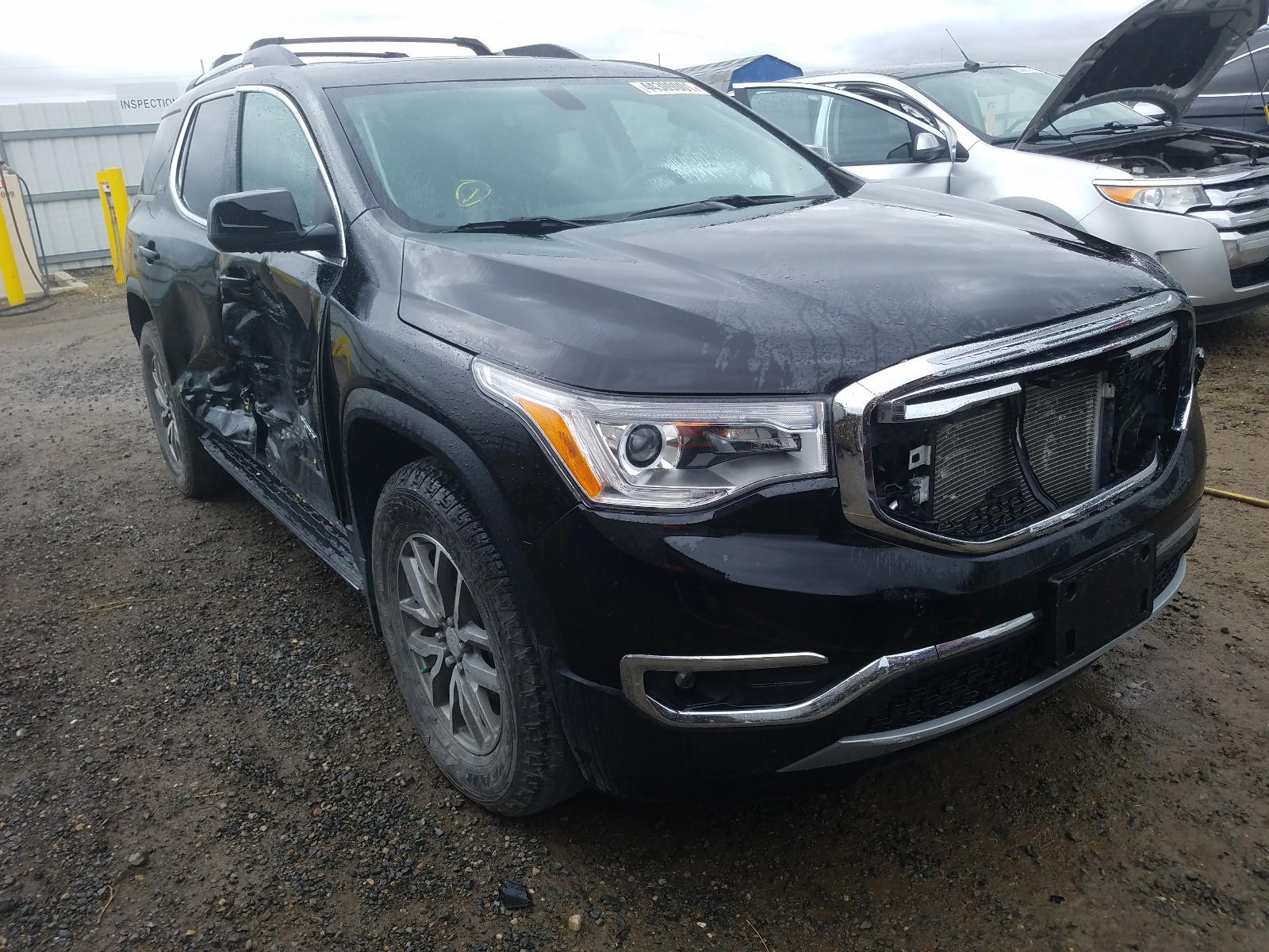 GMC ACADIA SLE 2018 with VIN 1GKKNSLS1JZ234958 - Photo from auction