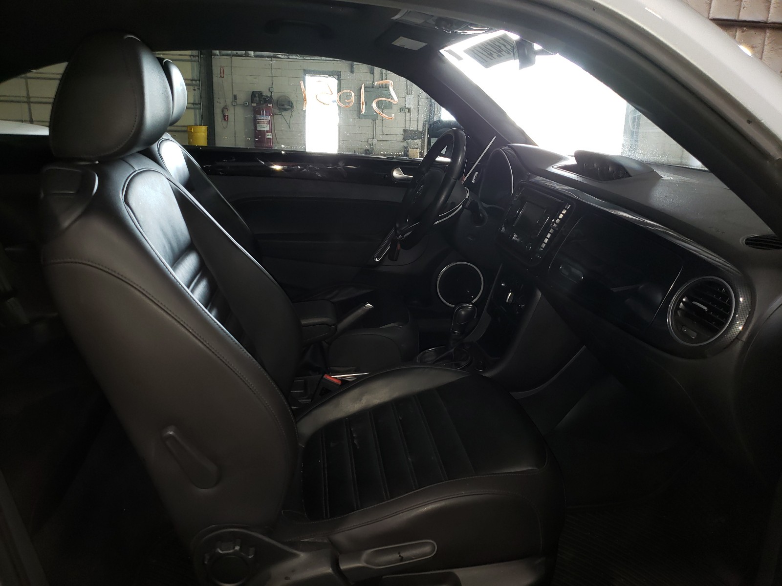 Photo 5 from auction – 2013 VOLKSWAGEN BEETLE TUR with VIN 3VWVA7AT1DM629626