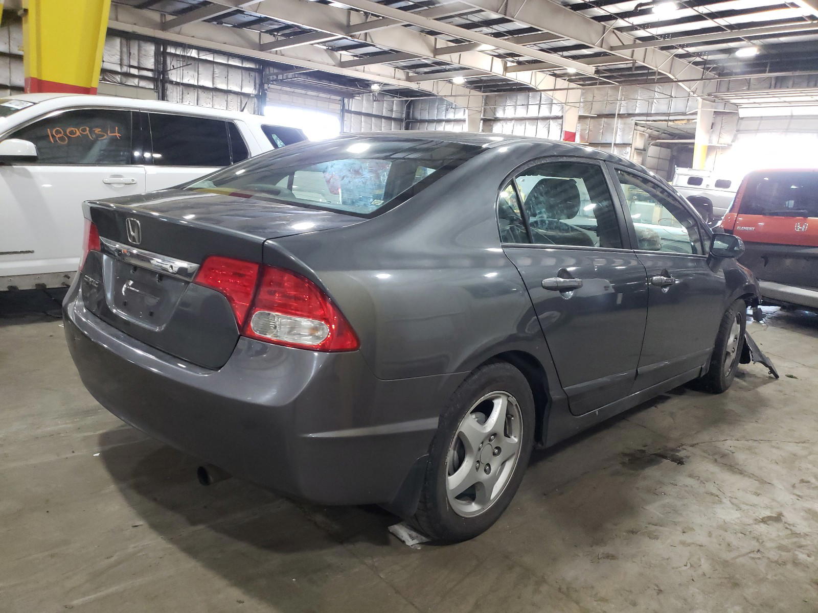 Photo 4 from auction – 2010 HONDA CIVIC LX with VIN 19XFA1F58AE024586