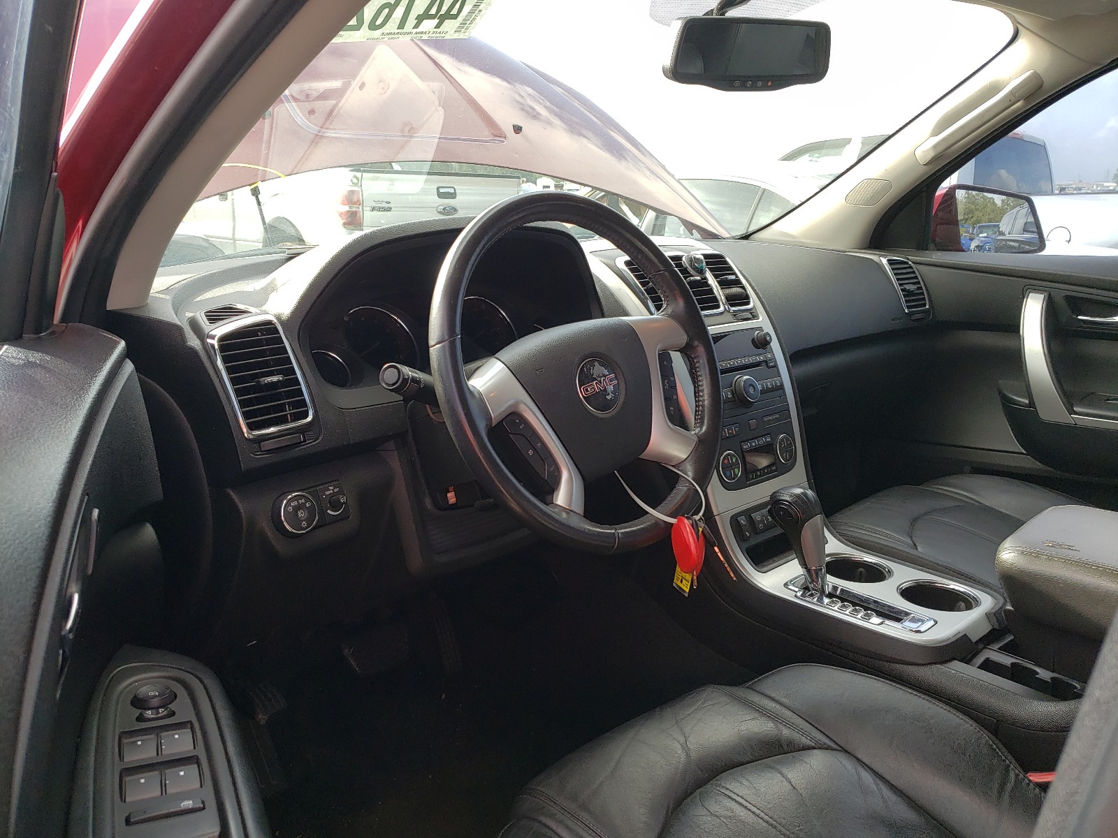 Photo 9 from auction – 2011 GMC ACADIA SLT with VIN 1GKKRRED1BJ321710
