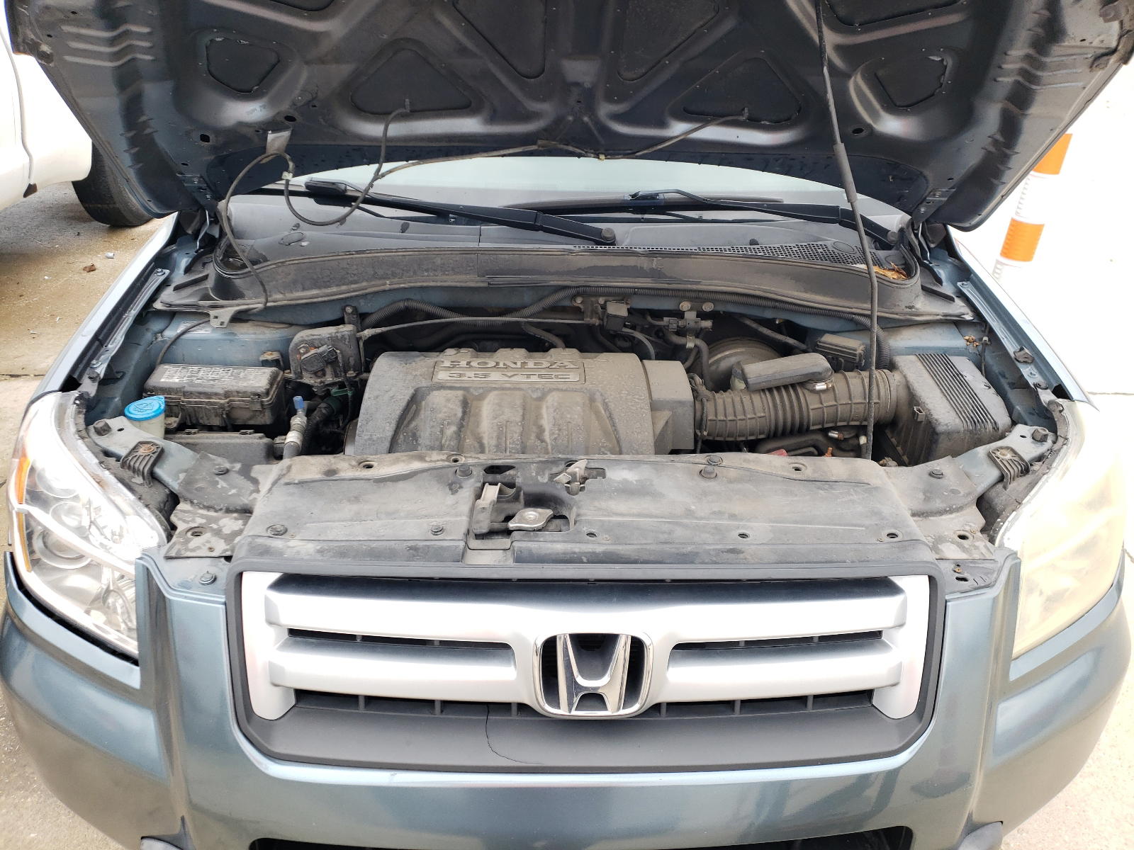Photo 7 from auction – 2006 HONDA PILOT LX with VIN 5FNYF18136B001447