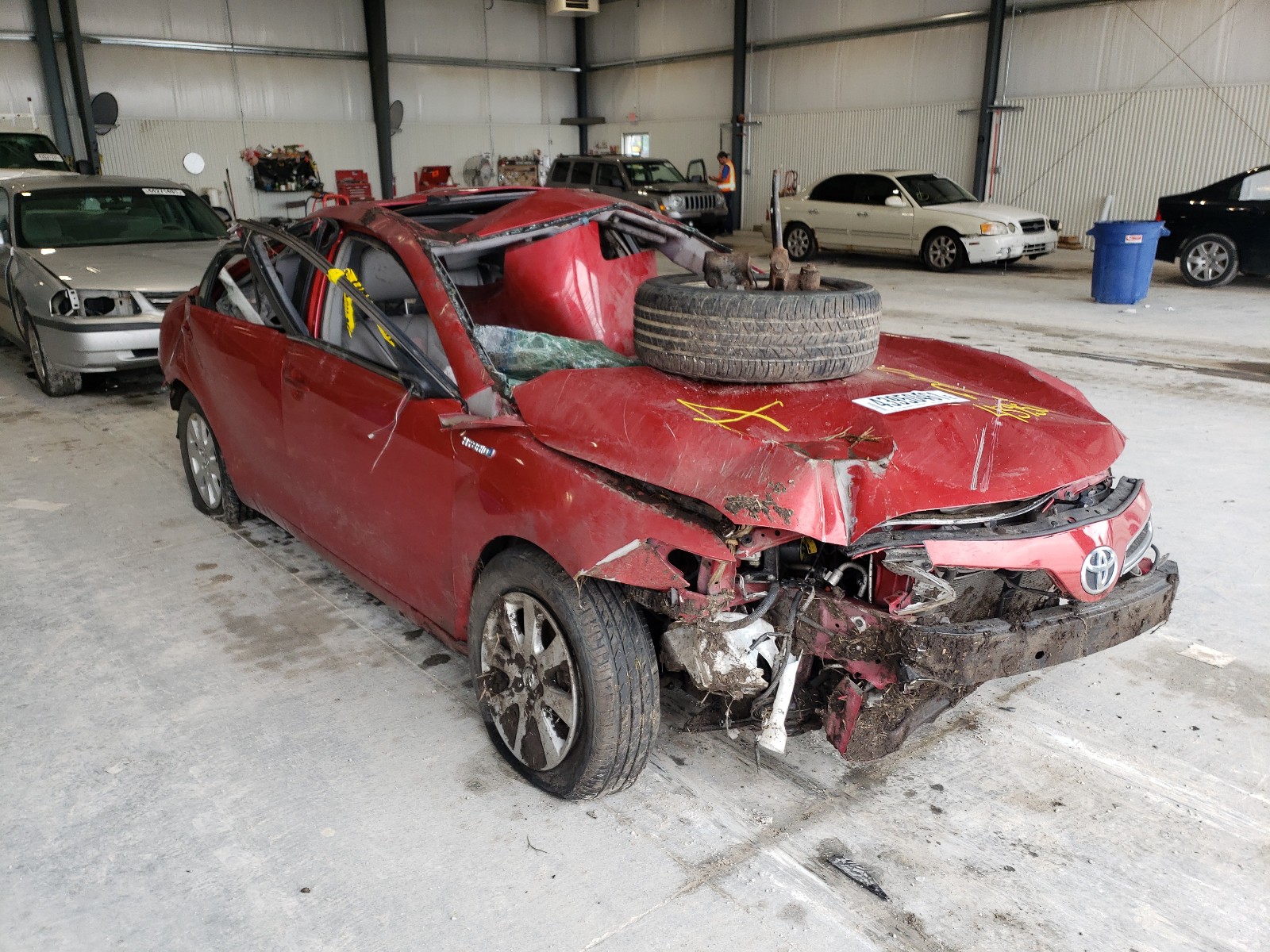 TOYOTA CAMRY HYBR 2007 with VIN JTNBB46K773039174 - Photo from auction