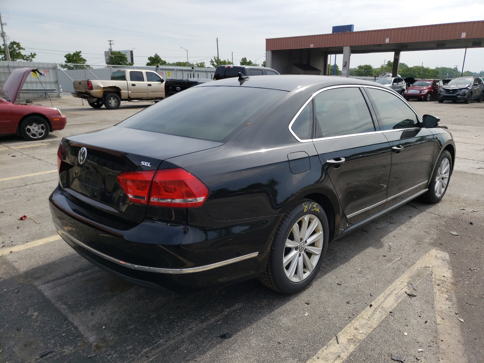 Photo 4 from auction – 2013 VOLKSWAGEN PASSAT SEL with VIN 1VWCH7A31DC047790