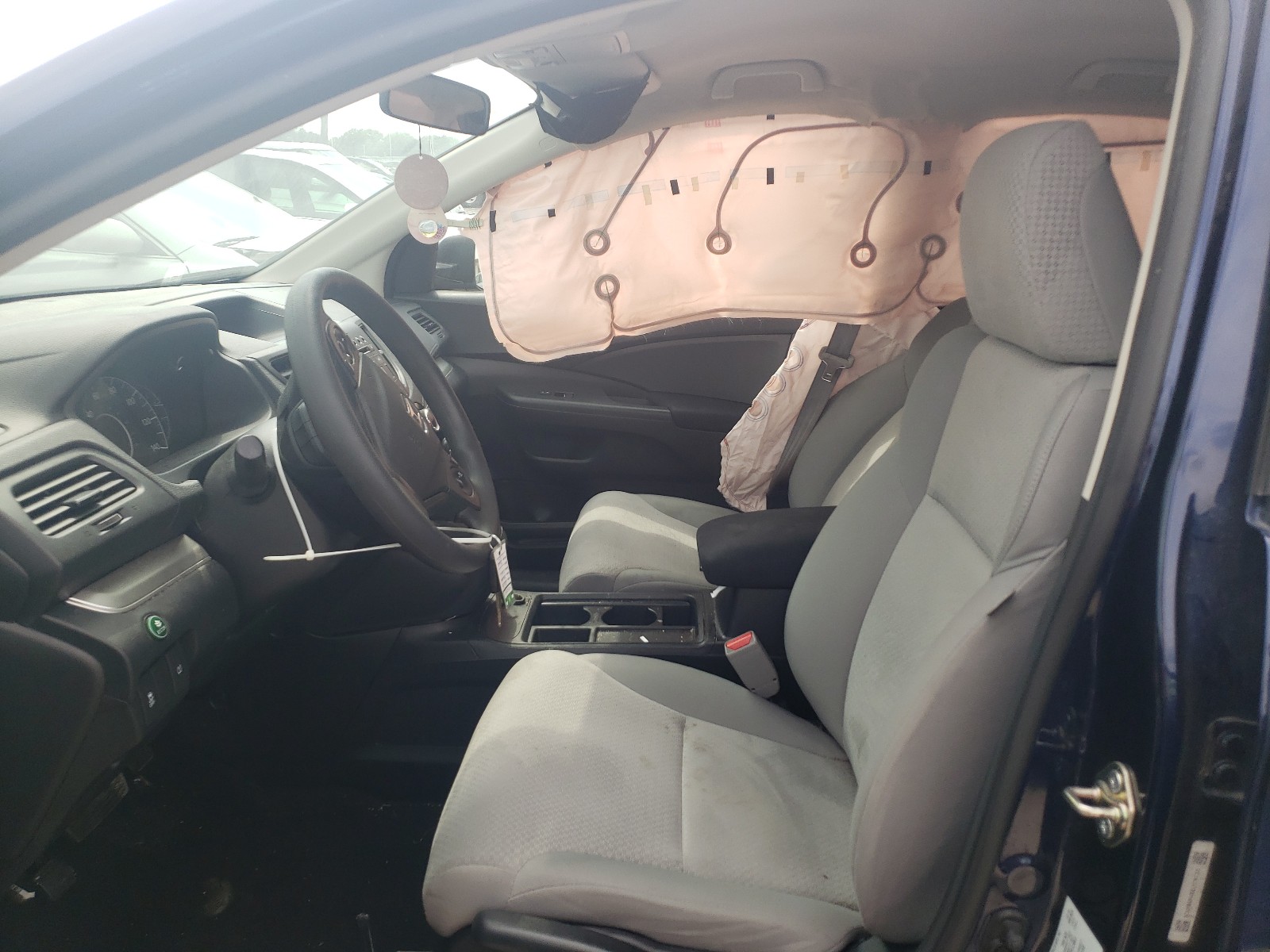 Photo 5 from auction – 2016 HONDA CR-V SE with VIN 5J6RM4H48GL126703