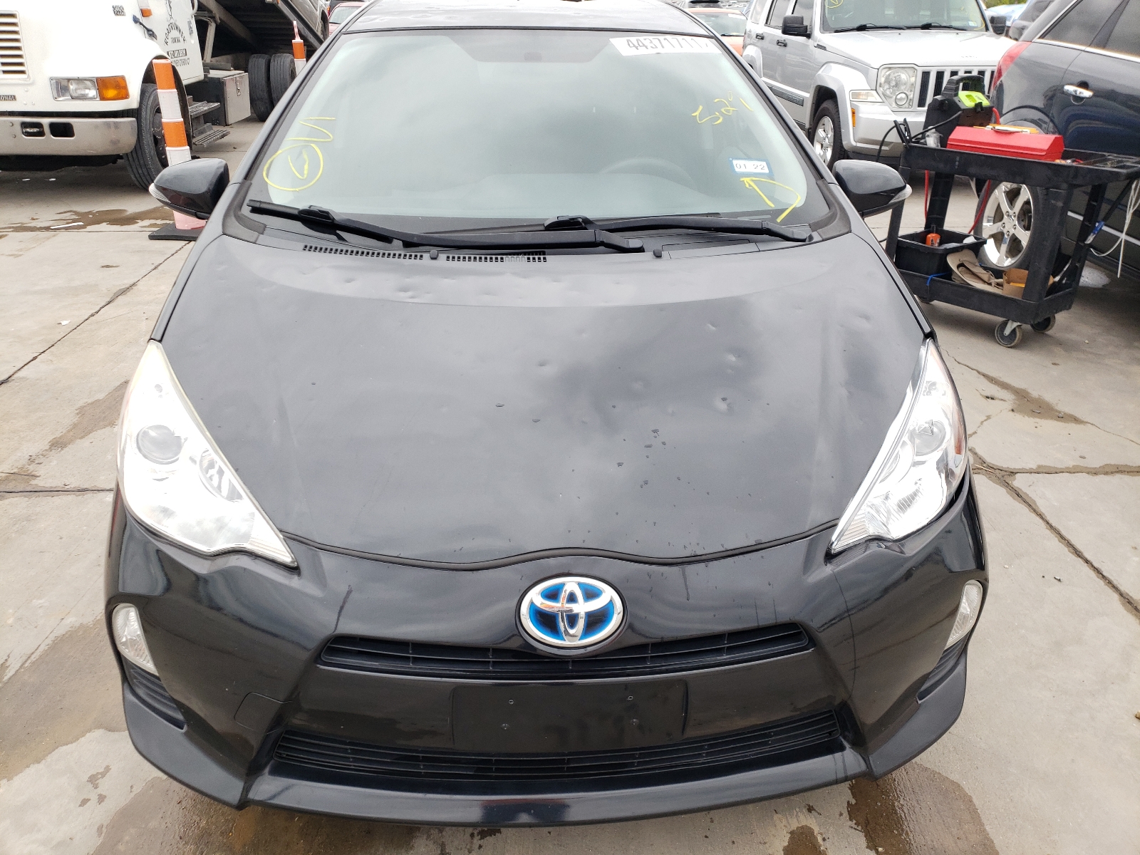 Photo 9 from auction – 2014 TOYOTA PRIUS C with VIN JTDKDTB35E1575217