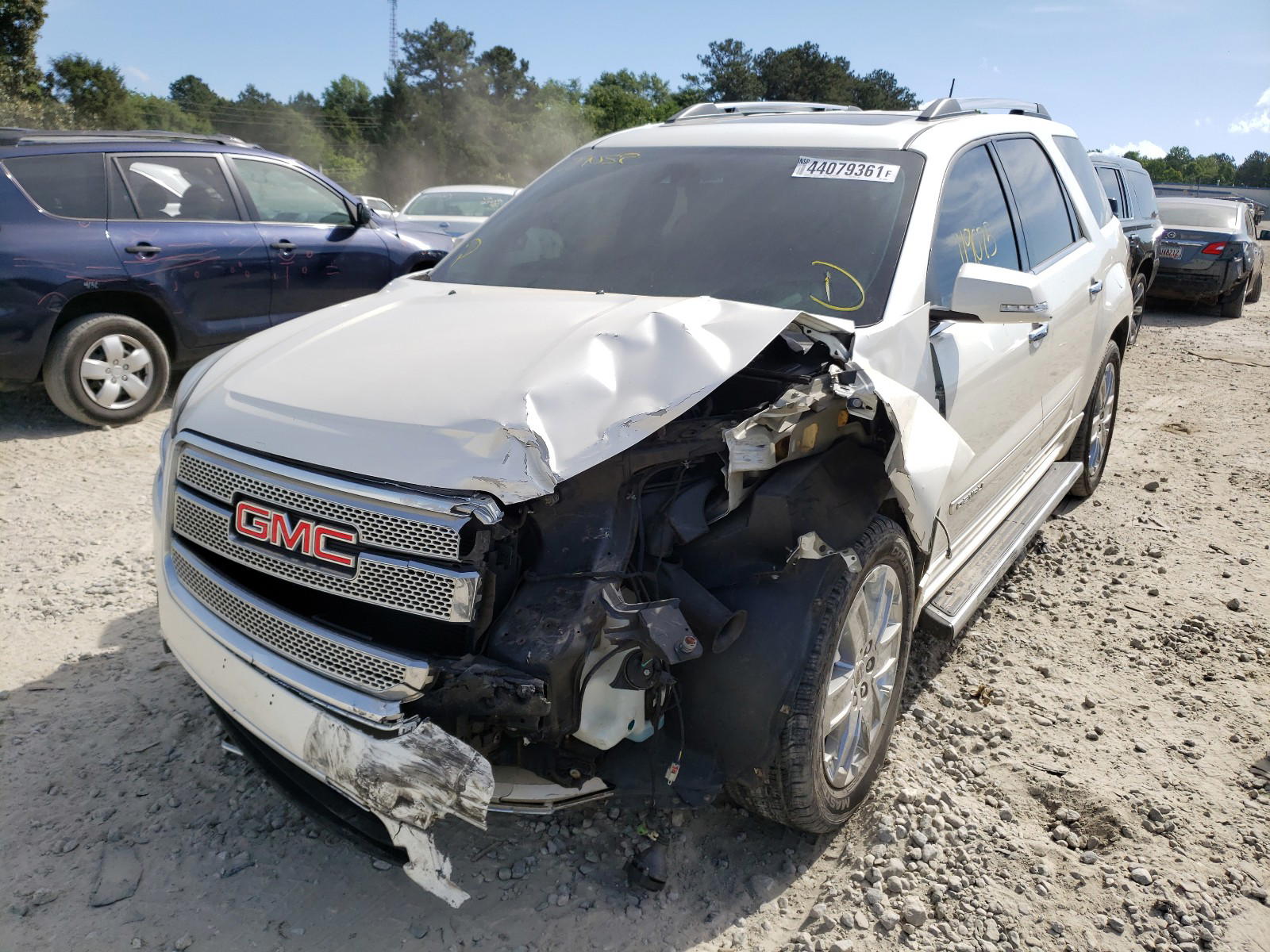 Photo 2 from auction – 2014 GMC ACADIA DEN with VIN 1GKKVTKD0EJ287549