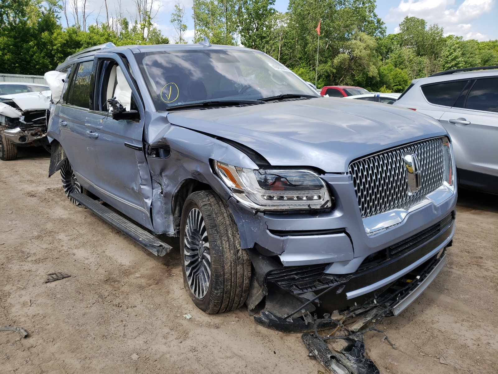 LINCOLN NAVIGATOR 2020 with VIN 5LMJJ2TT4LEL18254 - Photo from auction
