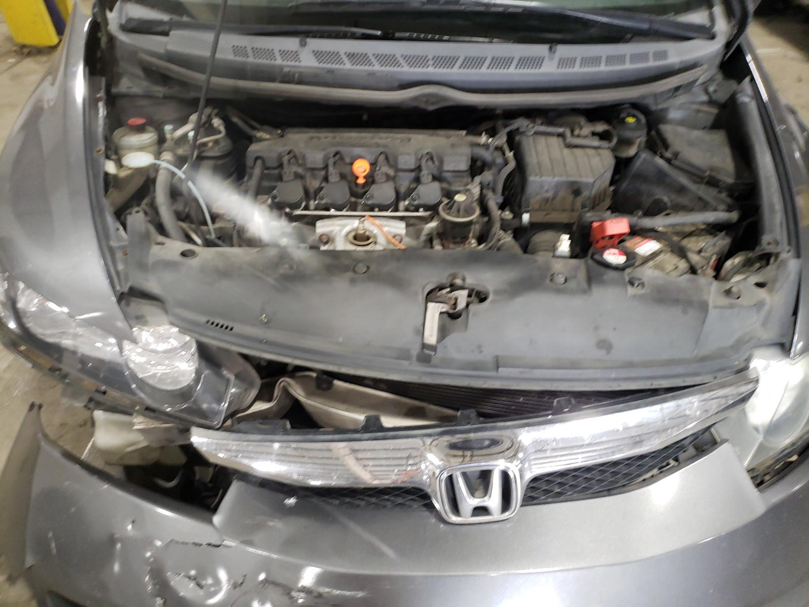 Photo 7 from auction – 2010 HONDA CIVIC LX with VIN 19XFA1F58AE024586