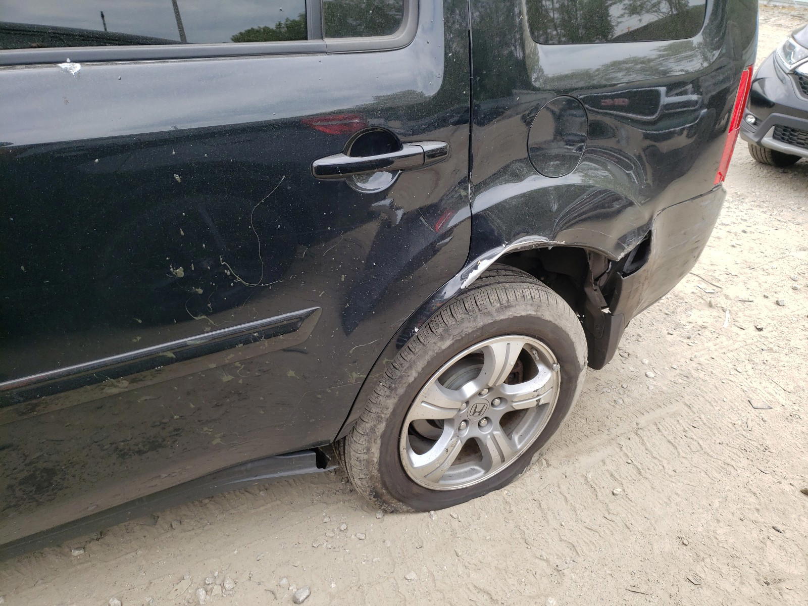Photo 9 from auction – 2014 HONDA PILOT EXL with VIN 5FNYF4H56EB053321