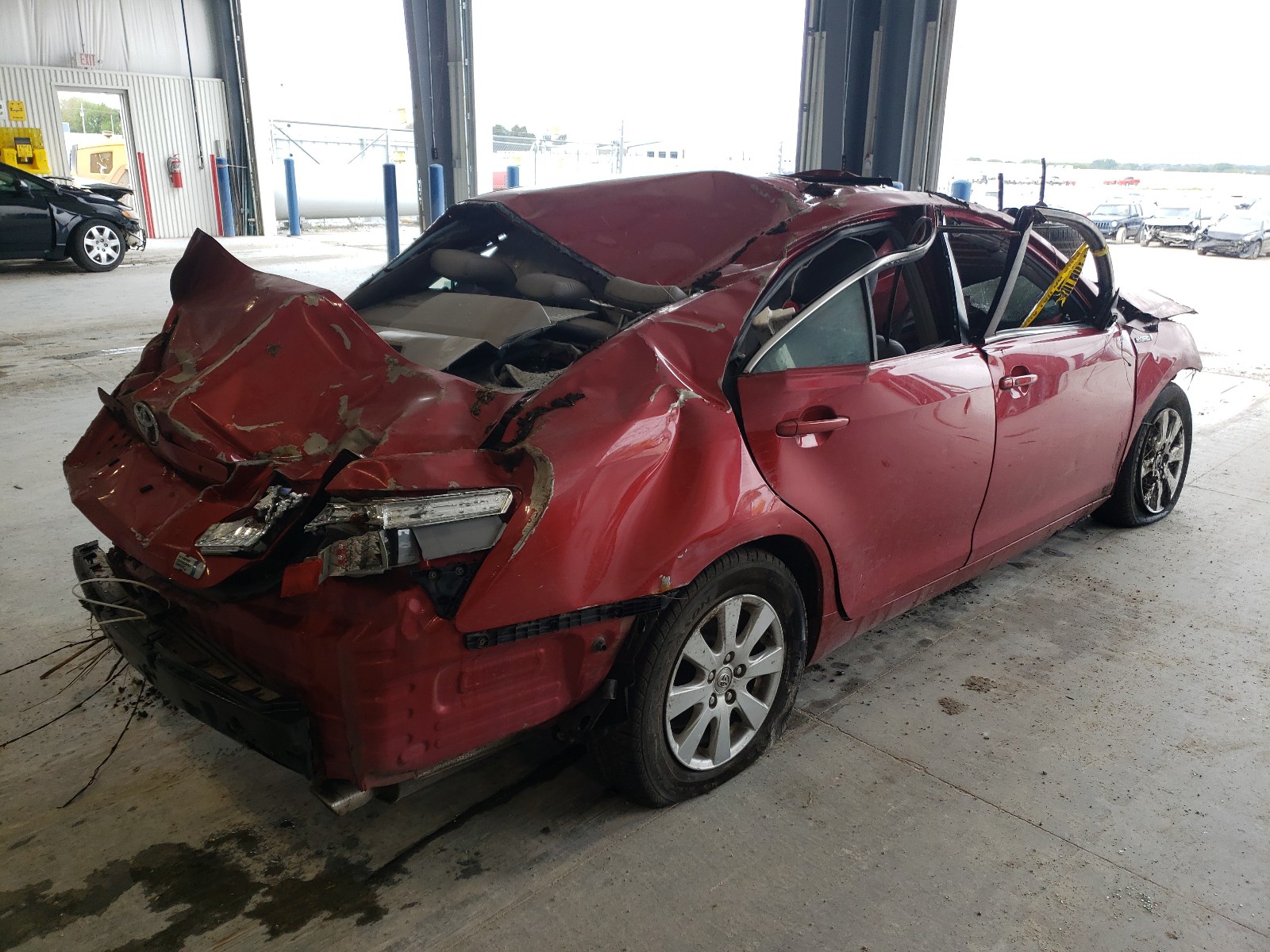 Photo 4 from auction – 2007 TOYOTA CAMRY HYBR with VIN JTNBB46K773039174