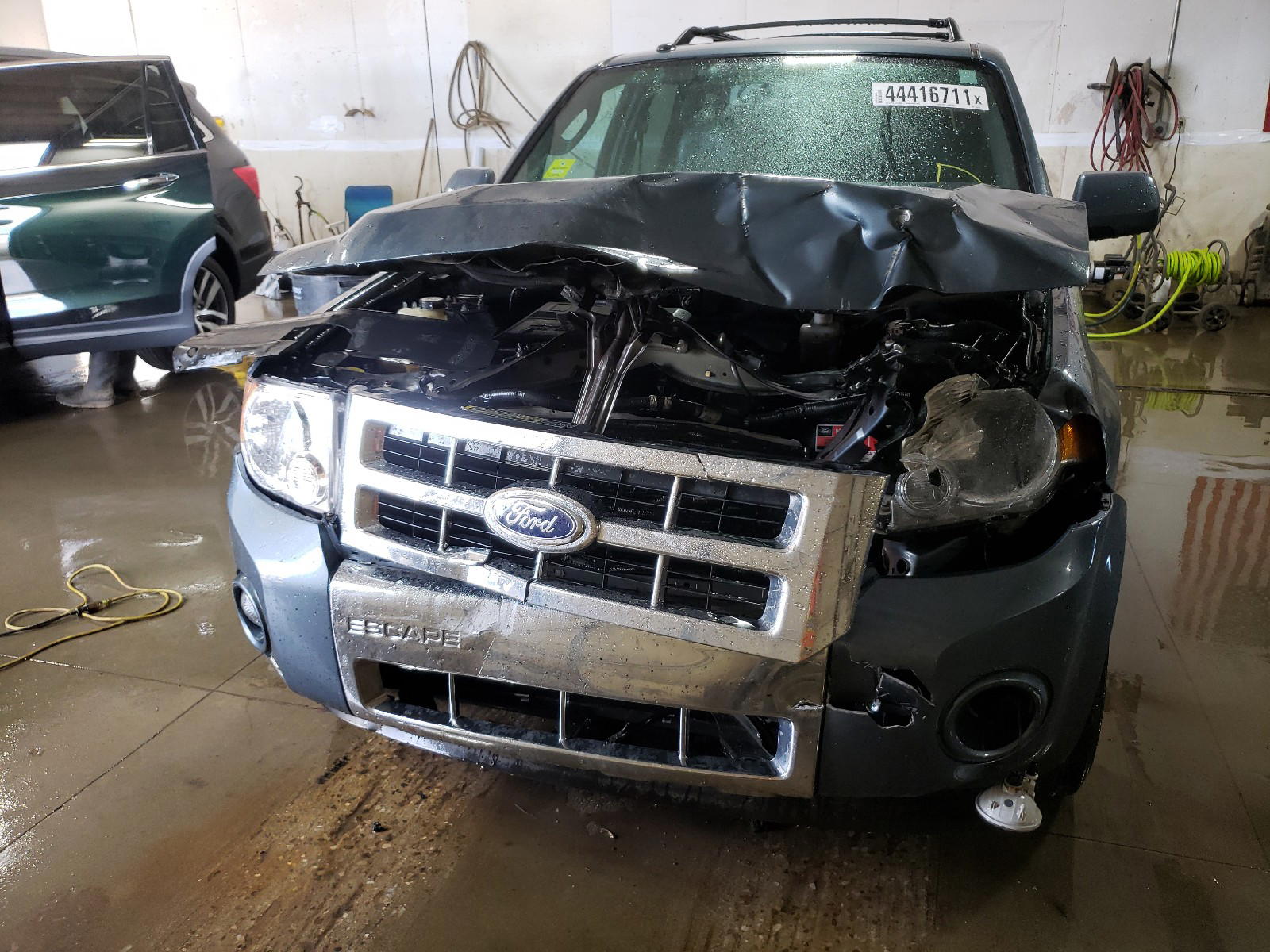 Photo 9 from auction – 2010 FORD ESCAPE LIM with VIN 1FMCU0EG6AKD05737