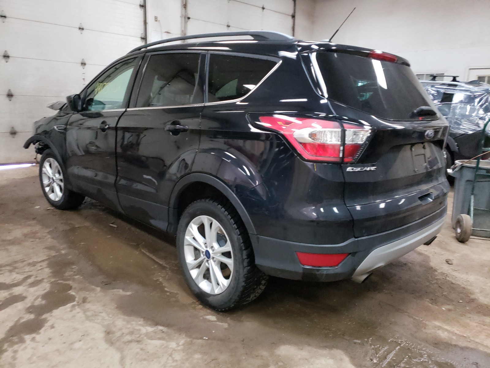 Photo 3 from auction – 2017 FORD ESCAPE SE with VIN 1FMCU9GD6HUD22060
