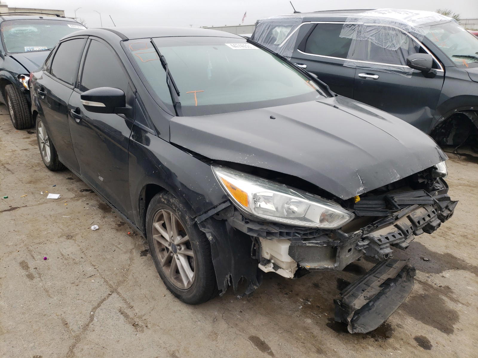 FORD FOCUS SE 2015 with VIN 1FADP3F27FL202340 - Photo from auction