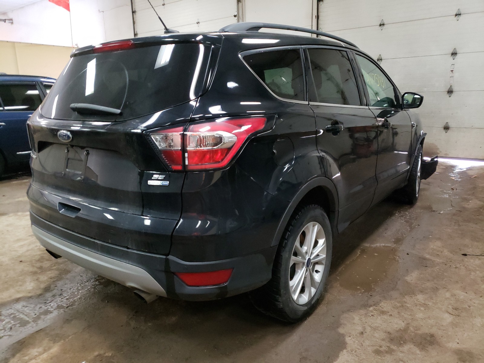 Photo 4 from auction – 2017 FORD ESCAPE SE with VIN 1FMCU9GD6HUD22060