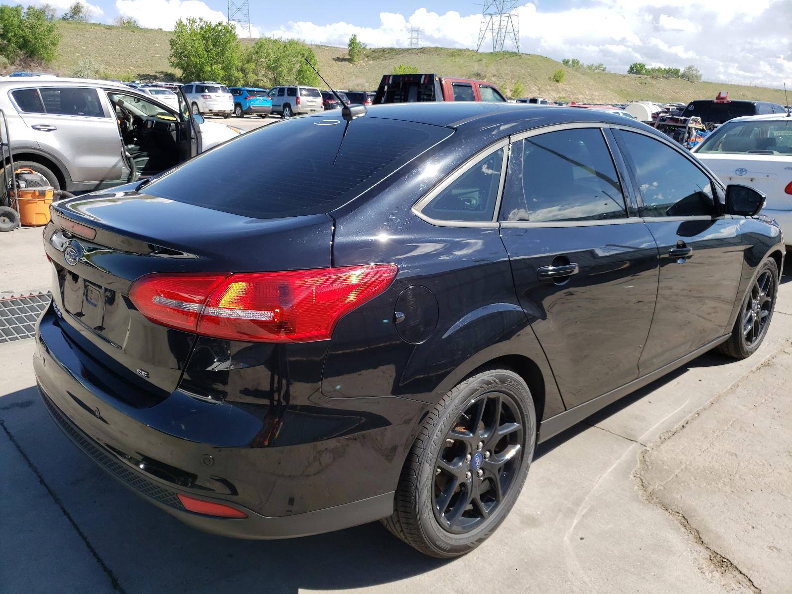Photo 4 from auction – 2016 FORD FOCUS SE with VIN 1FADP3F26GL354806