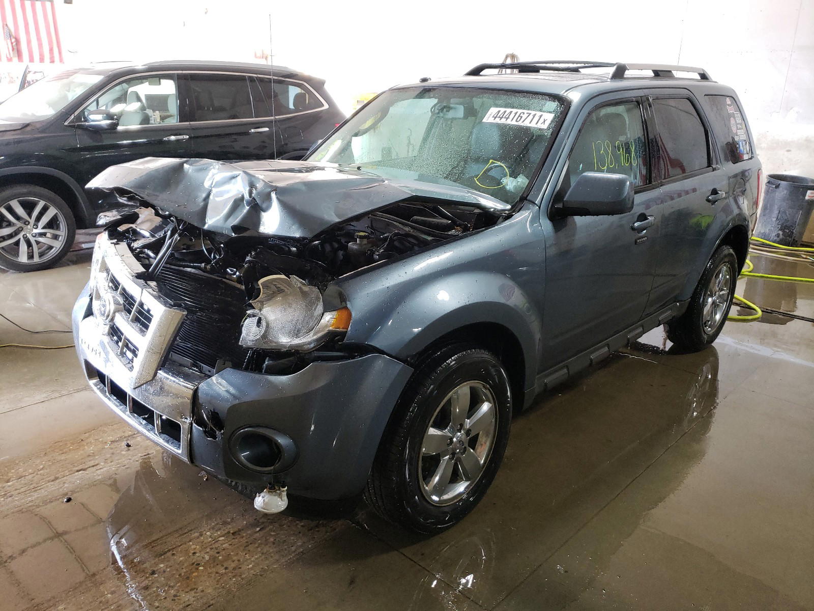 Photo 2 from auction – 2010 FORD ESCAPE LIM with VIN 1FMCU0EG6AKD05737