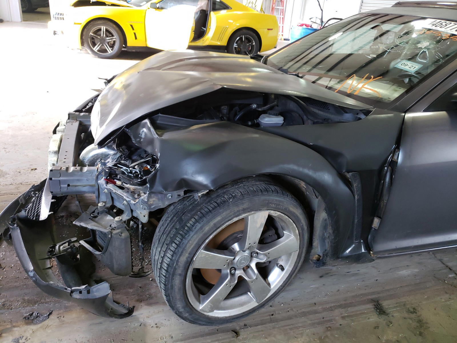 Photo 9 from auction – 2006 MAZDA RX8 with VIN JM1FE173760205356