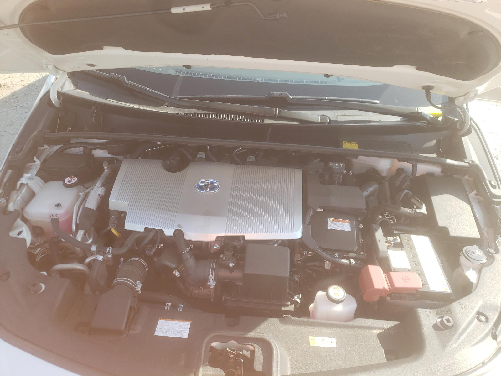 Photo 7 from auction – 2017 TOYOTA PRIUS PRIM with VIN JTDKARFP1H3000355