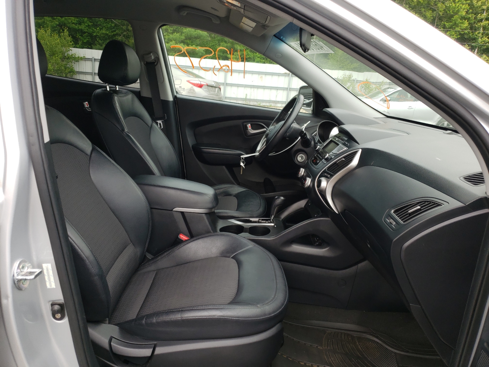 Photo 5 from auction – 2012 HYUNDAI TUCSON GLS with VIN KM8JUCAC0CU473778