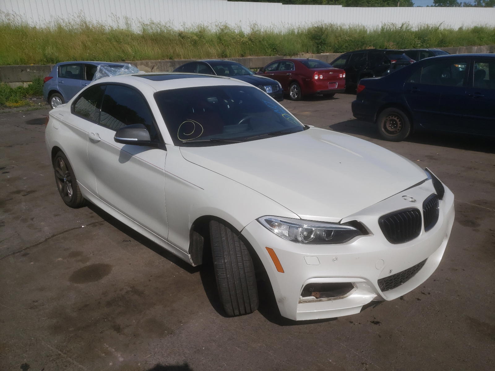BMW M235XI 2015 with VIN WBA1J9C59FV371115 - Photo from auction