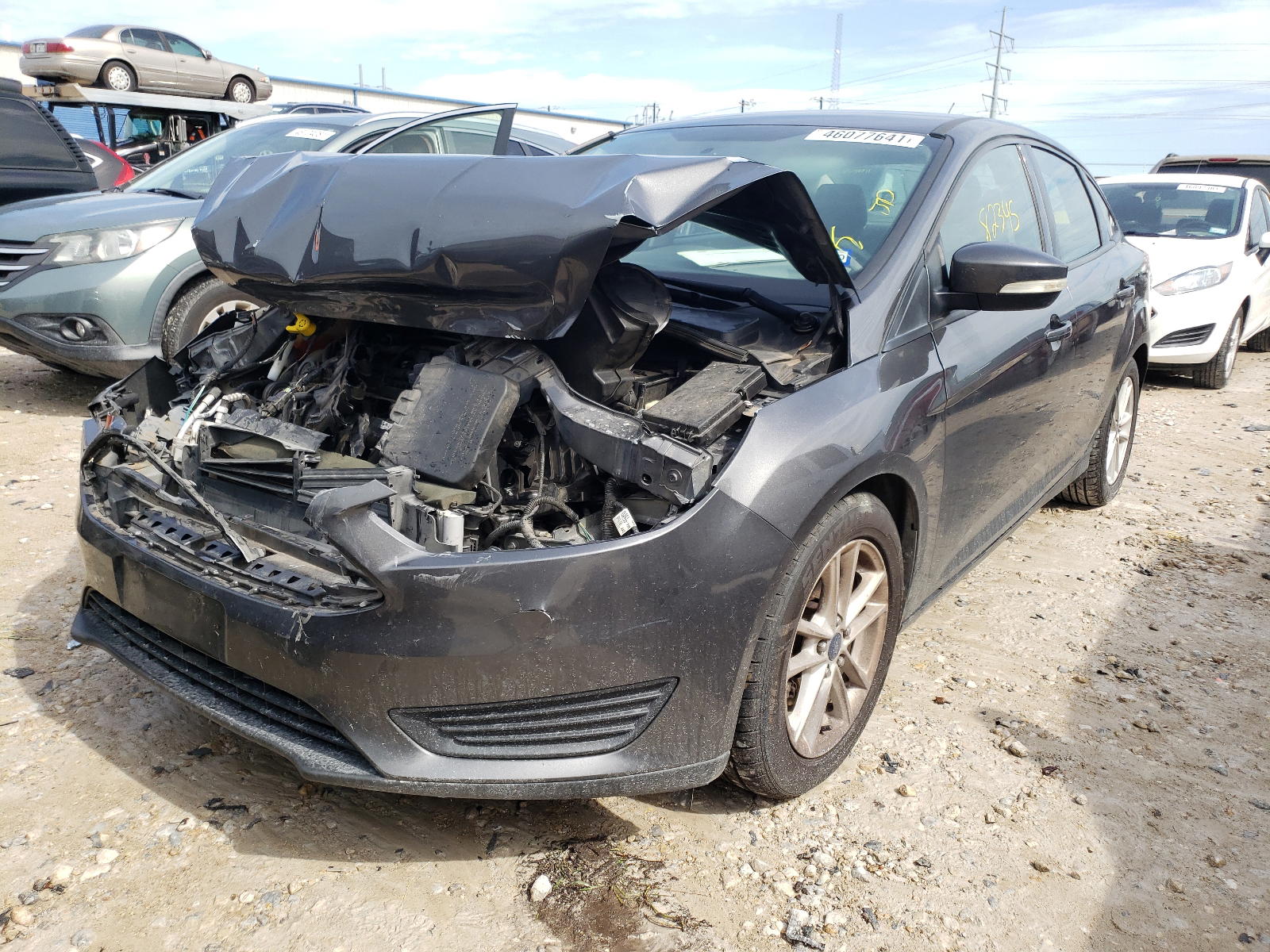 Photo 2 from auction – 2016 FORD FOCUS SE with VIN 1FADP3F25GL245320