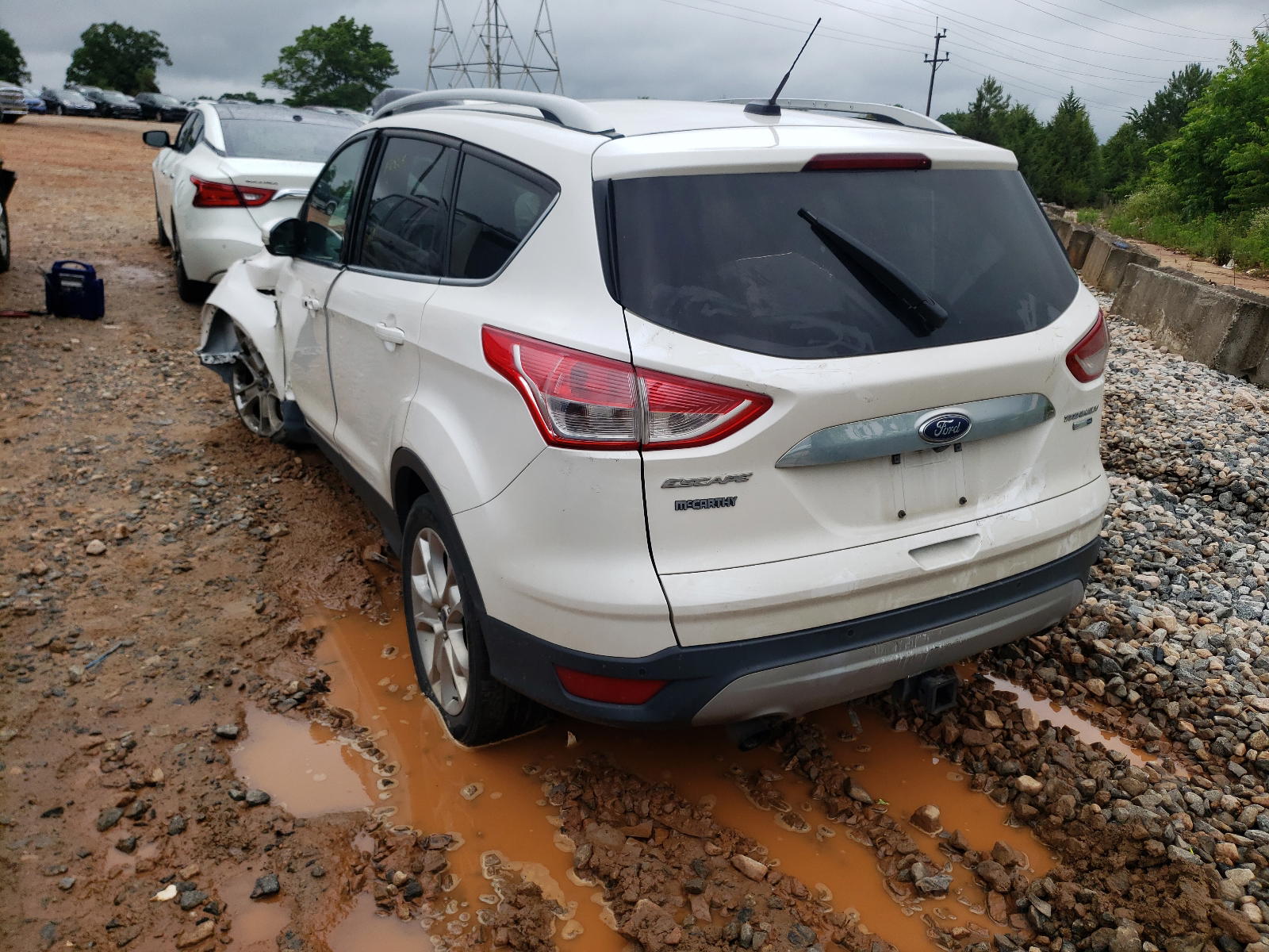 Photo 3 from auction – 2016 FORD ESCAPE TIT with VIN 1FMCU9J99GUB37360