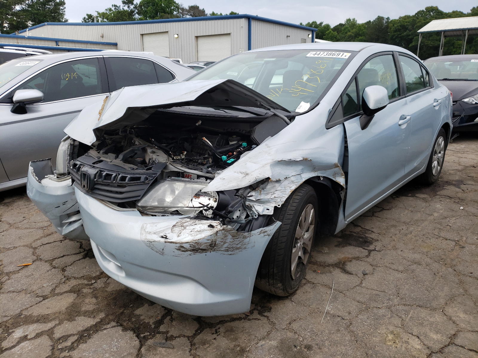 Photo 2 from auction – 2012 HONDA CIVIC LX with VIN 2HGFB2F52CH509883