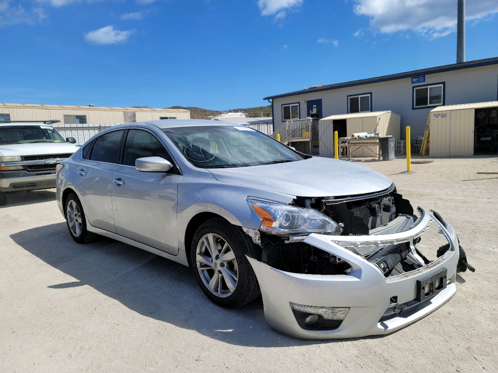 NISSAN ALTIMA 2.5 2015 with VIN 1N4AL3AP0FC268021 - Photo from auction