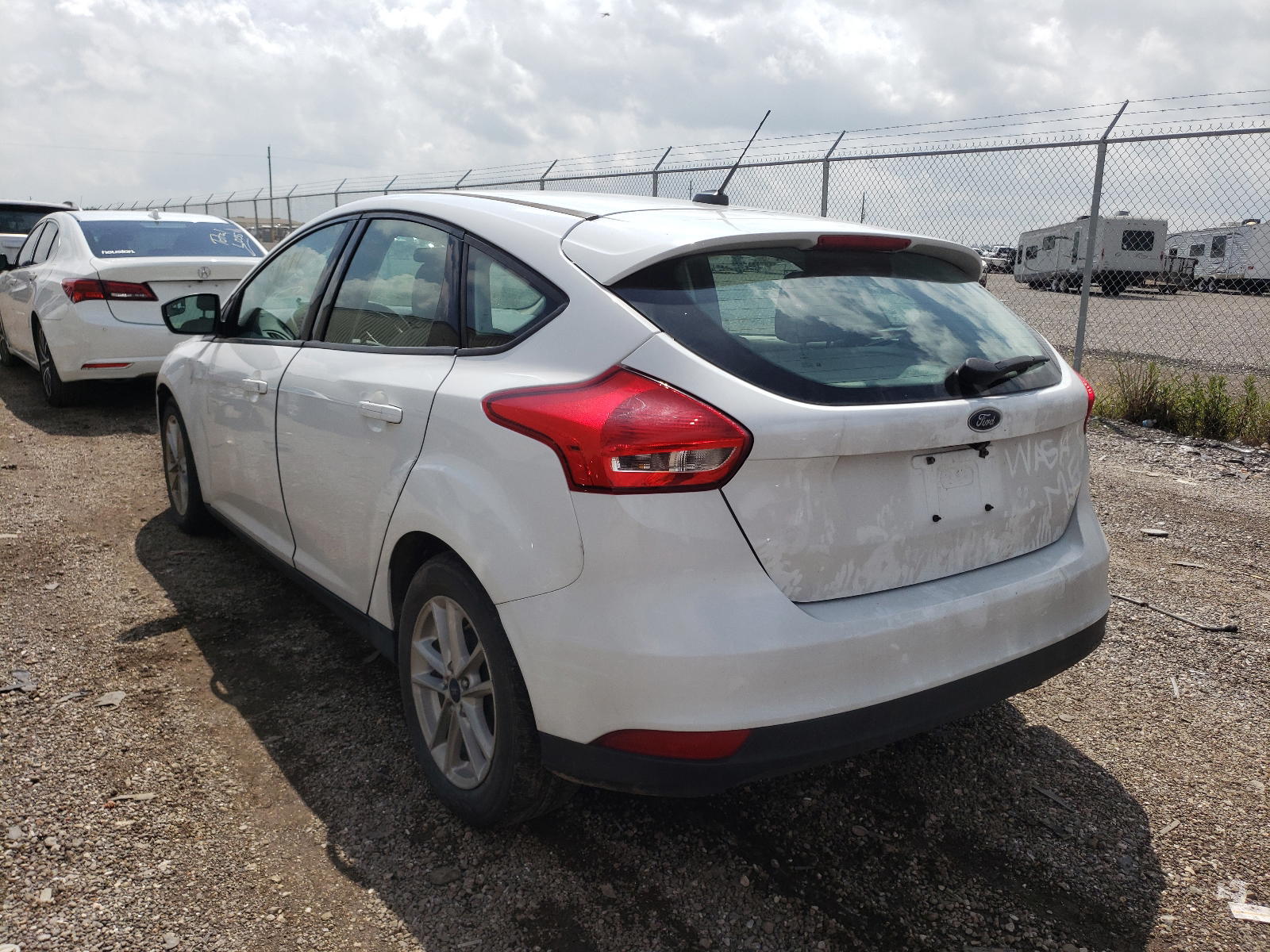 Photo 3 from auction – 2018 FORD FOCUS SE with VIN 1FADP3K23JL295047